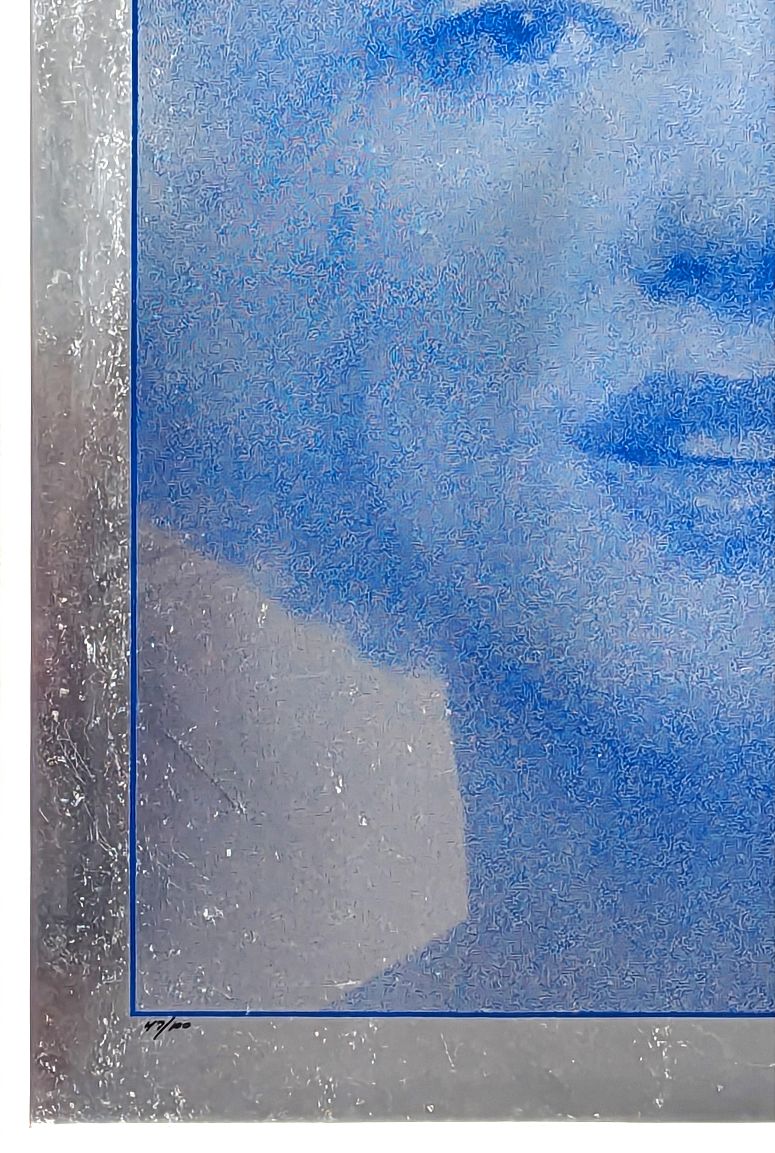 Blue-toned silkscreen portrait print of actress Marilyn Monroe by legendary photographer Bert Stern. The piece features a blue headshot portrait of Marilyn in blue on a metallic silver foil. 
Signed and editioned along the front lower margin.