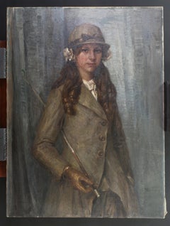 Antique Portrait of a young girl in riding attire