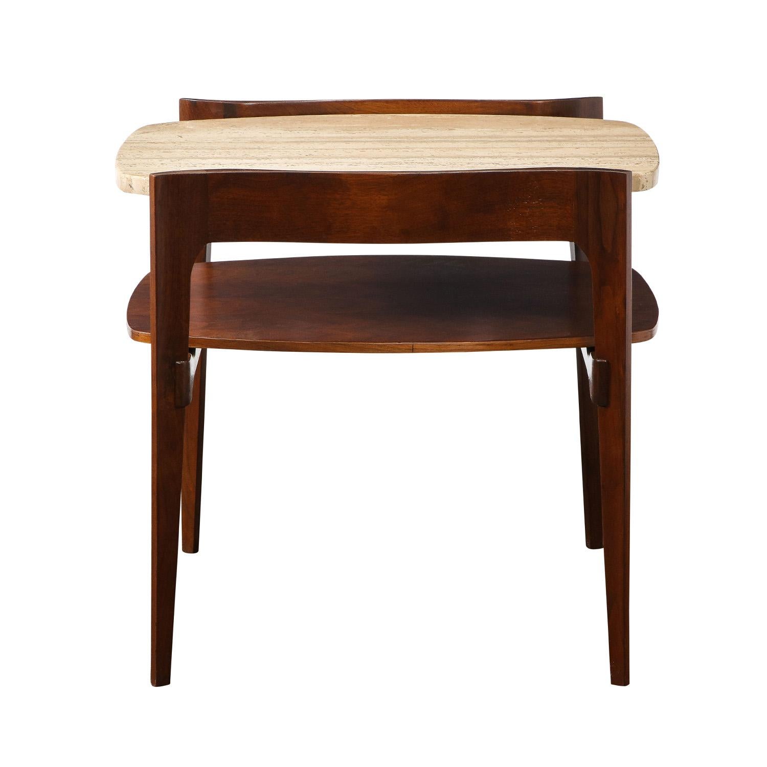 Elegant 2-tier side table in walnut with inset travertine top by Bertha Schaefer for R. Singer & Sons, American 1950's. This table has been completely refinished.