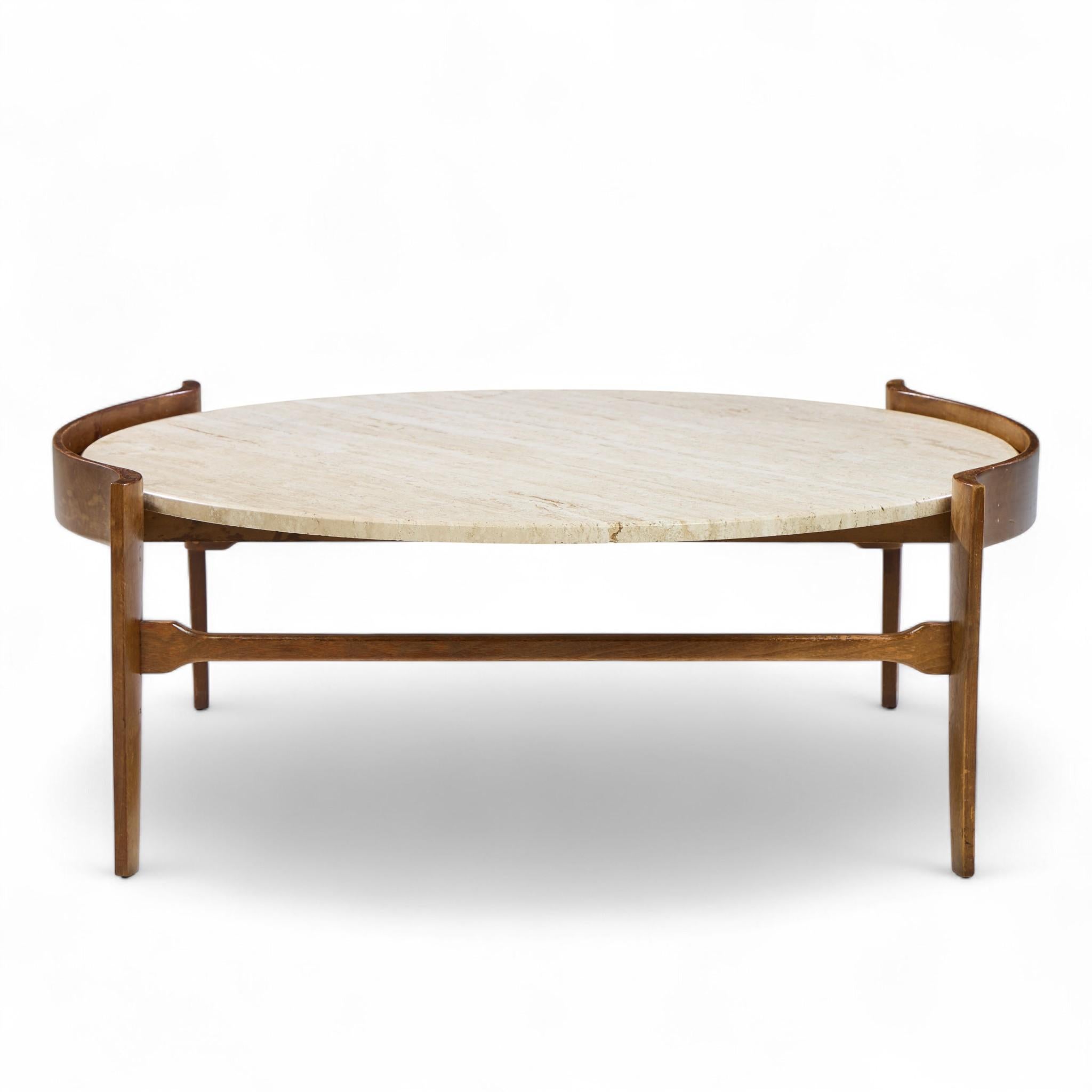Bertha Schaefer for Singer and Sons Mid Century Travertine and Walnut Coffee Table

This coffee table measures: 40.25 wide x 38.5 deep x 15 inches high

Great Vintage Condition - Minor Areas of Wear on Table Frame. Travertine is in Great Shape.