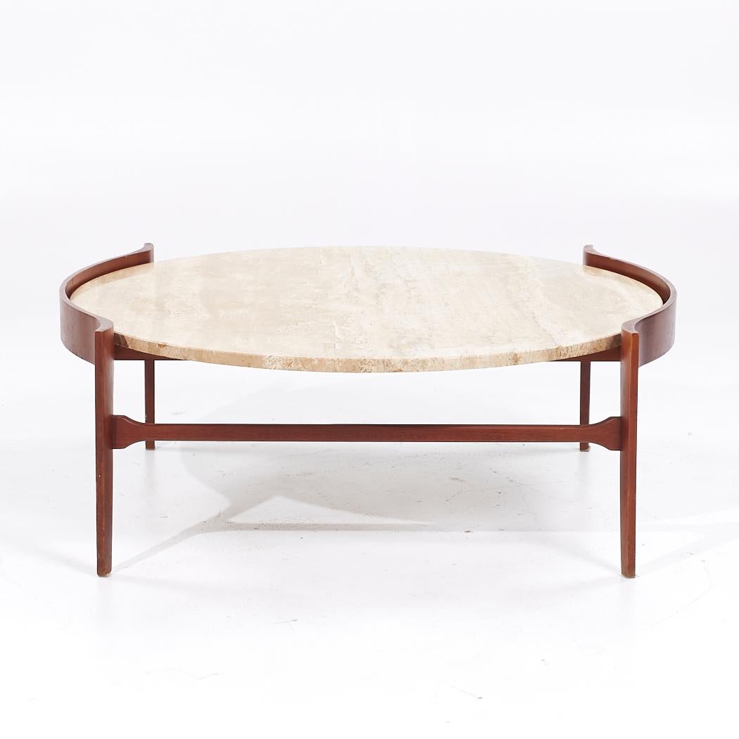 Bertha Schaefer Mid Century Sculpted Travertine and Walnut Coffee Table

This coffee table measures: 40 wide x 38.5 deep x 15 inches high

All pieces of furniture can be had in what we call restored vintage condition. That means the piece is