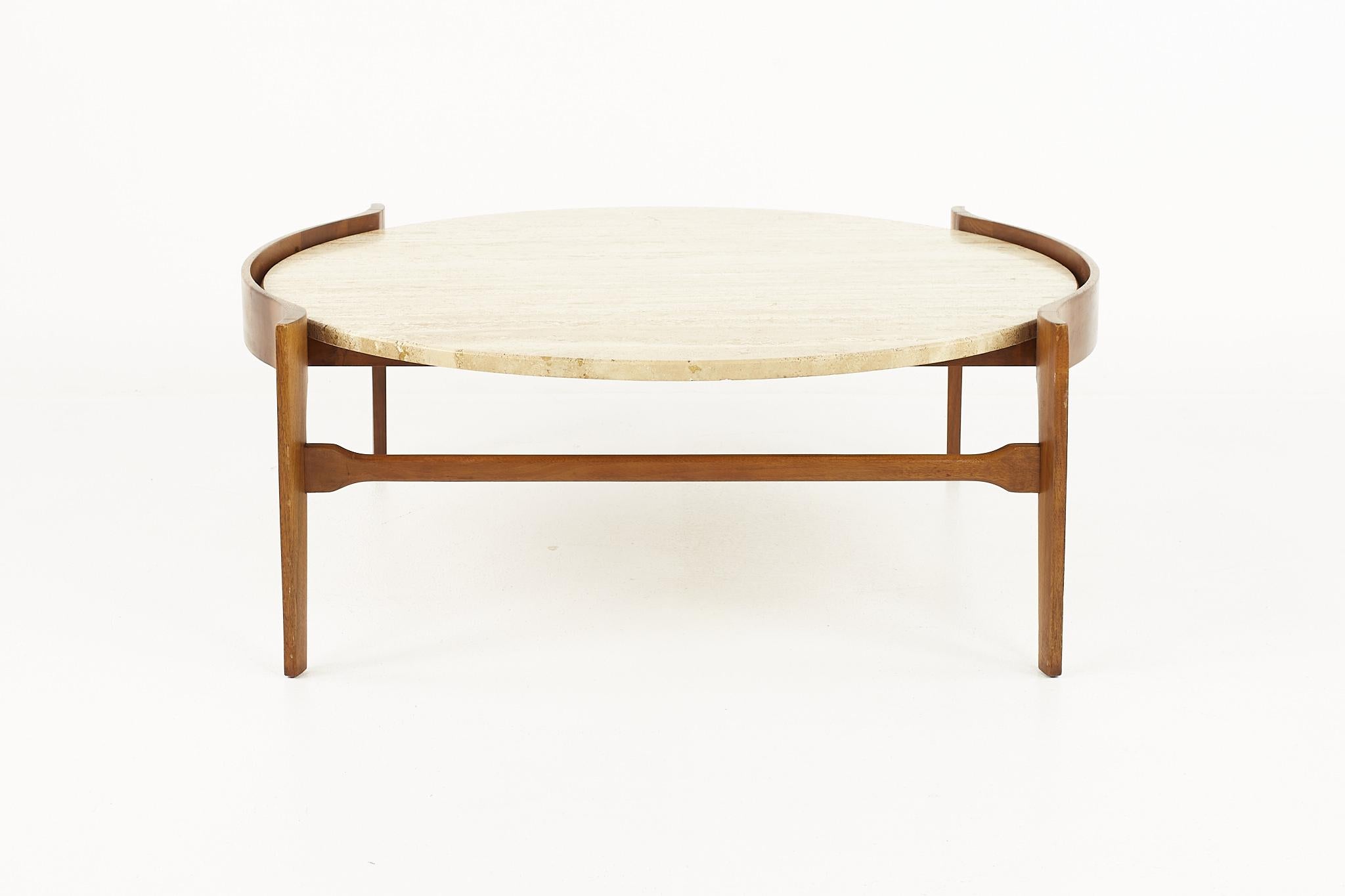 Bertha Schaefer Mid Century travertine and walnut coffee table

Coffee table measures: 40.5 wide x 38.5 deep x 15 inches high

All pieces of furniture can be had in what we call restored vintage condition. That means the piece is restored upon