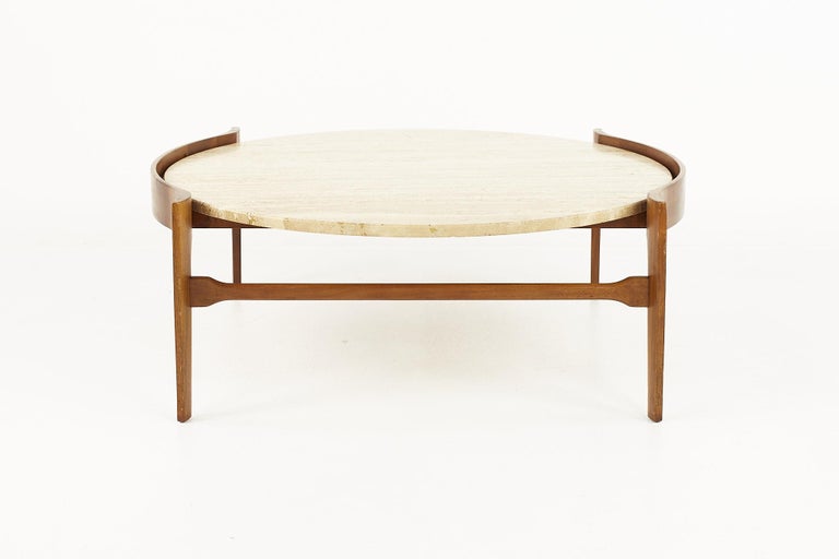 Bertha Schaefer Mid Century travertine and walnut coffee table

Coffee table measures: 40.5 wide x 38.5 deep x 15 inches high

All pieces of furniture can be had in what we call restored vintage condition. That means the piece is restored upon