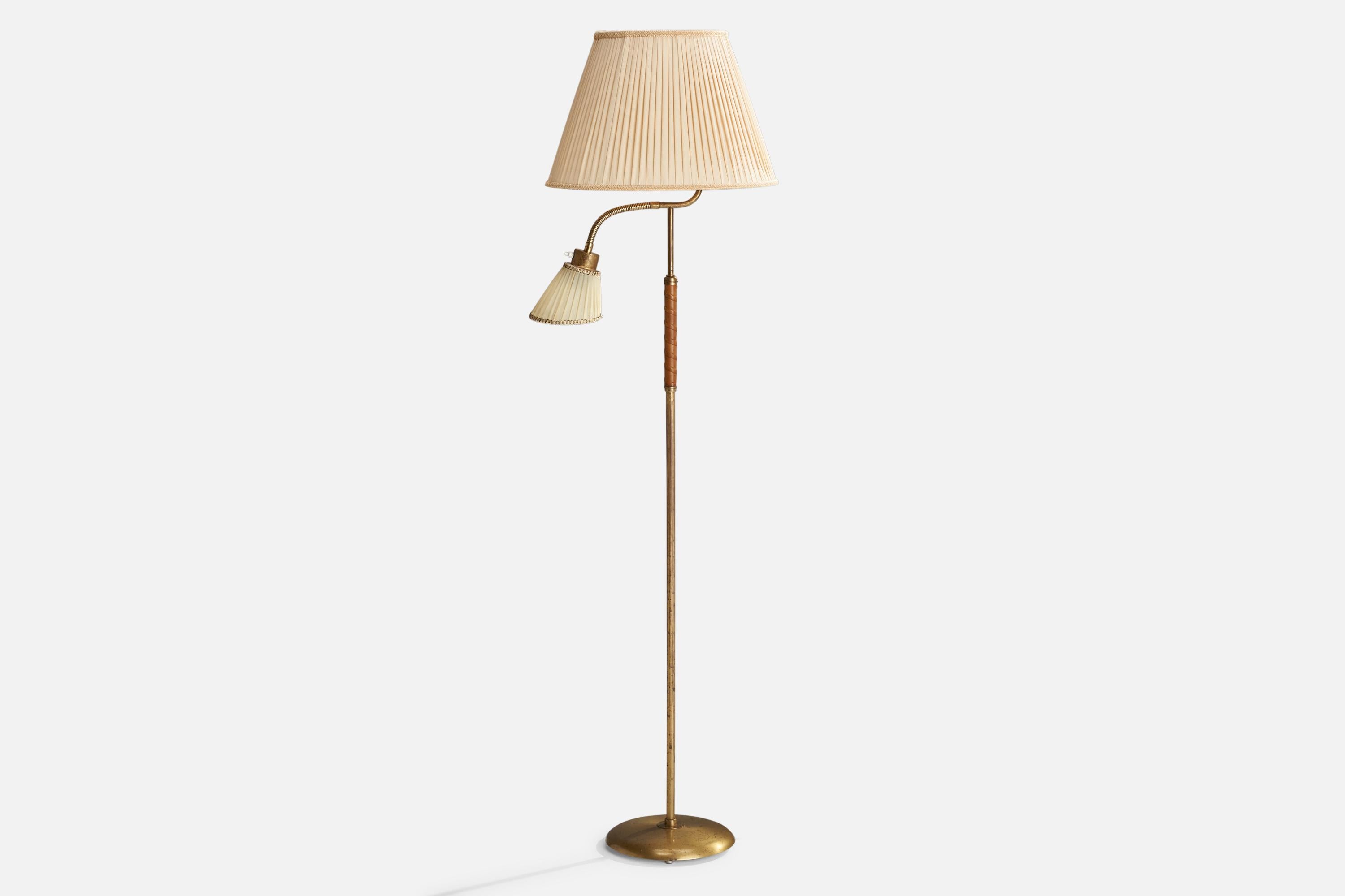 A two-armed brass, fabric and brown leather floor lamp designed by Bertil Brisborg and produced by Nordiska Kompaniet, Sweden, 1950s.

Overall Dimensions (inches): 66.5” H x 18” W x 19” D
Stated dimensions include shade.
Bulb Specifications: E-26
