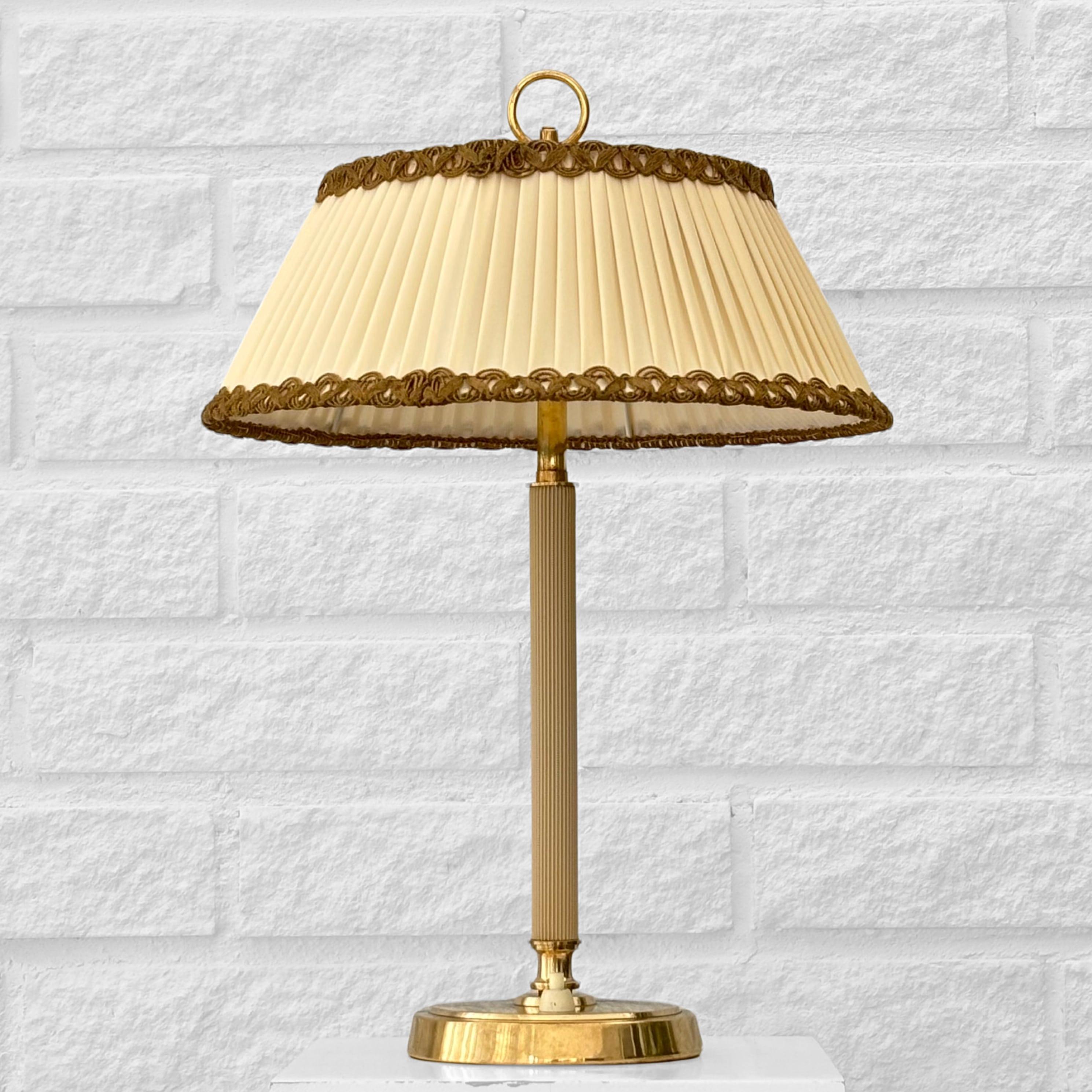Swedish Bertil Brisborg, Nordiska Kompaniet, table lamp, brass & textile, Sweden, 1940s For Sale