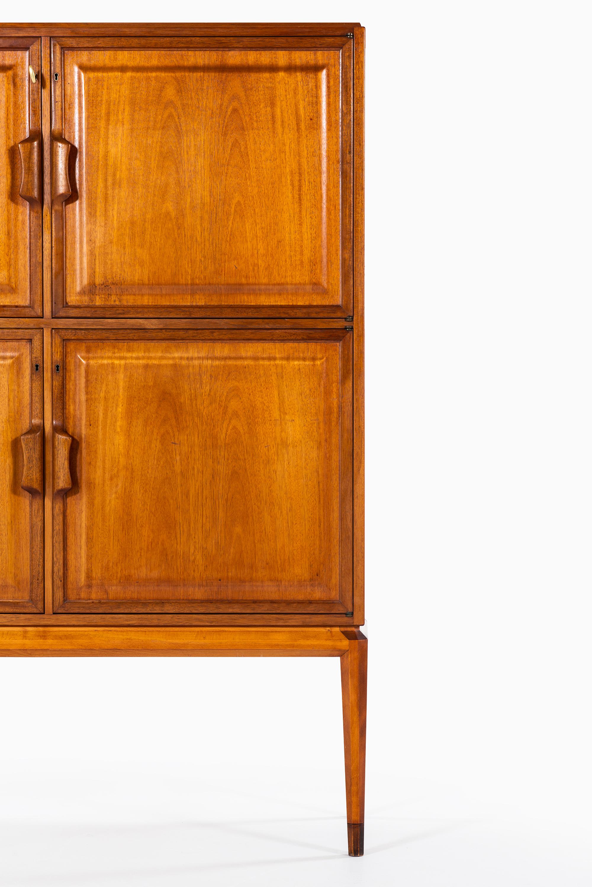 Rare cabinet model Facett designed by Bertil Fridhagen. Produced by Bodafors in Sweden.