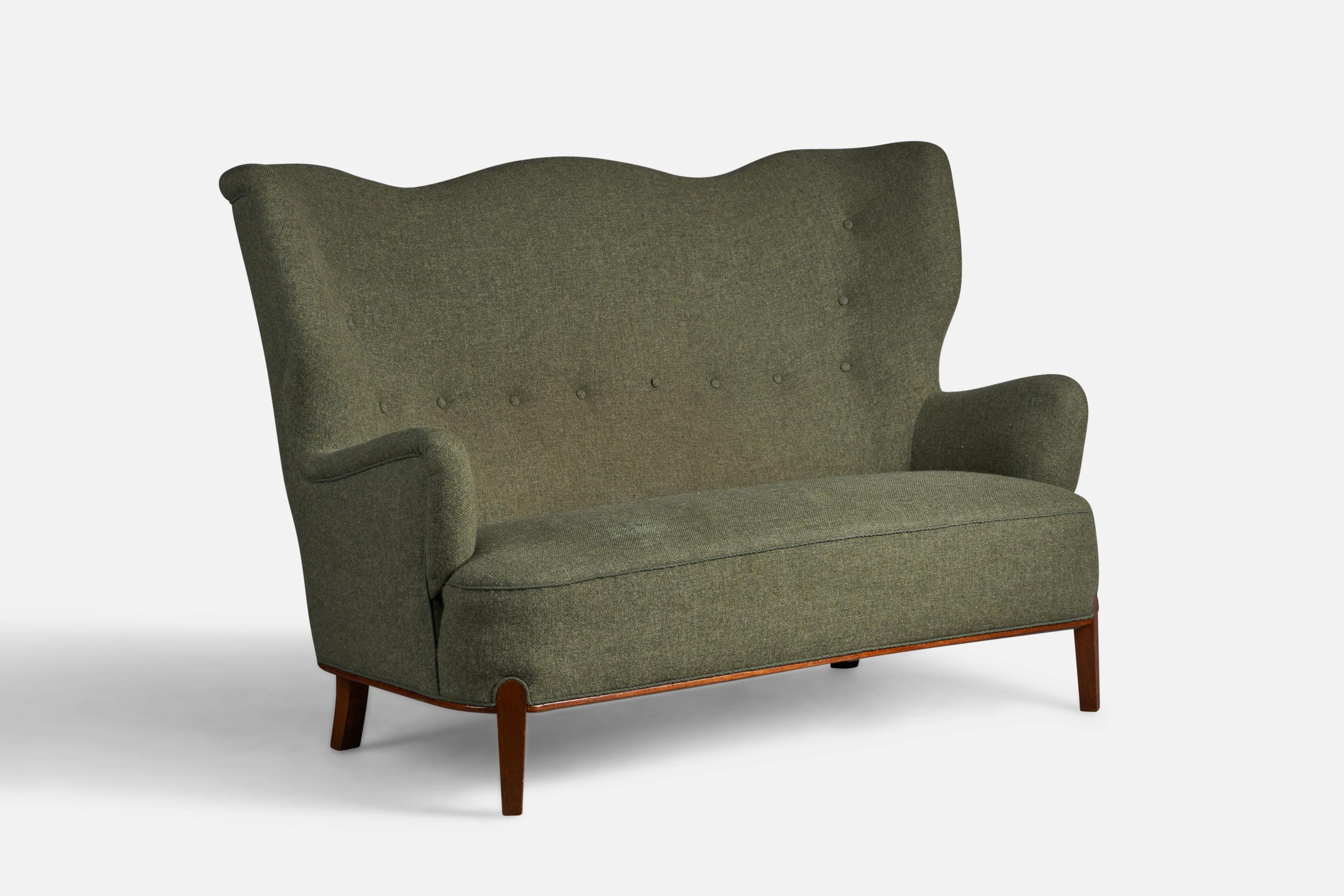 A stained beech and green fabric two-seater sofa or settee, designed by Bertil Söderberg and produced by Nordiska Kompaniet, Sweden, 1940s.

18” seat height
