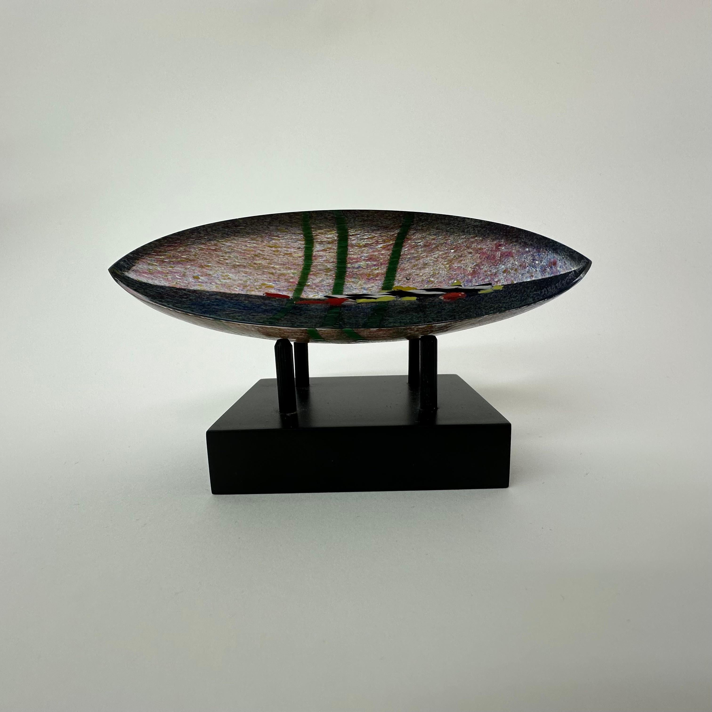 Dimensions: 17.5cm W, 5,5cmD, 4cm H With stand: 8cm H
Signed by artist