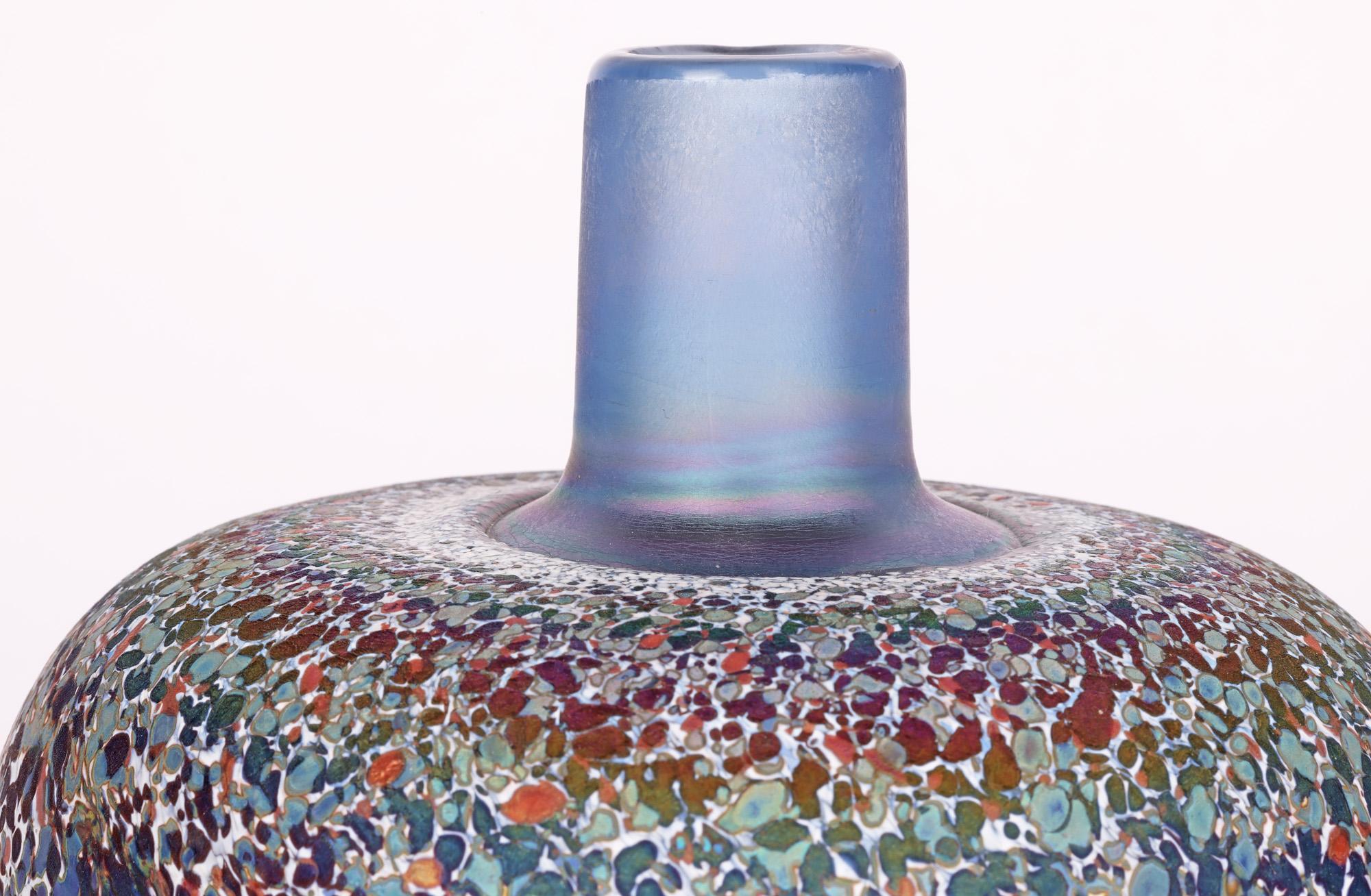 A rare and striking Swedish art glass vase made for Kosta Boda by renowned glass maker Bertil Vallien (Swedish, b.1938) and dating from the 1970’s. The square bodied vase is decorated in colored confetti pattern and and is one of a series of