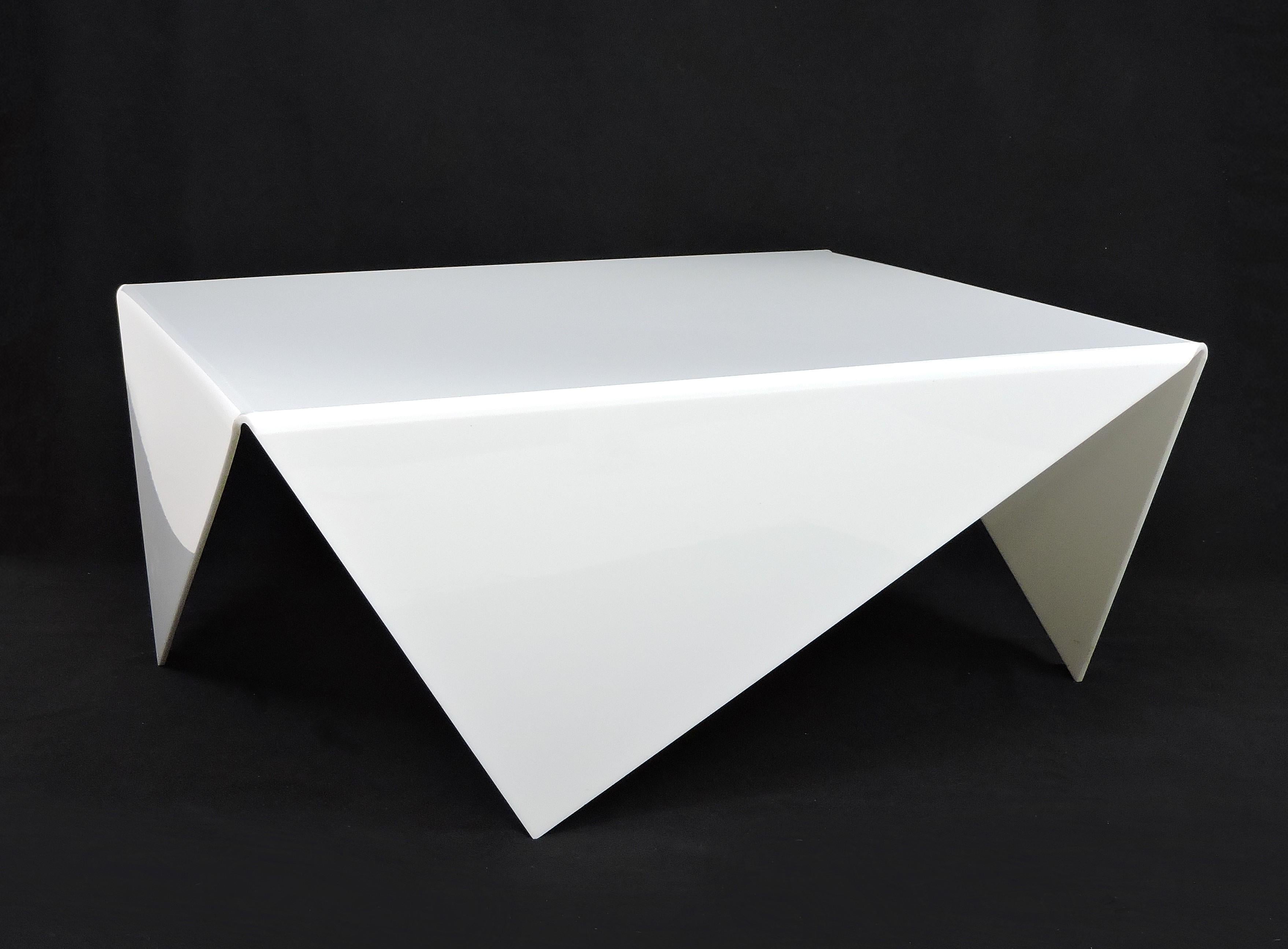 Striking coffee table made from white acrylic in the style of the Mouchoir table designed by Bertin France in the 1970s. The difference is that the design of this table is slightly larger and the sides are asymmetrical rather than symmetrical