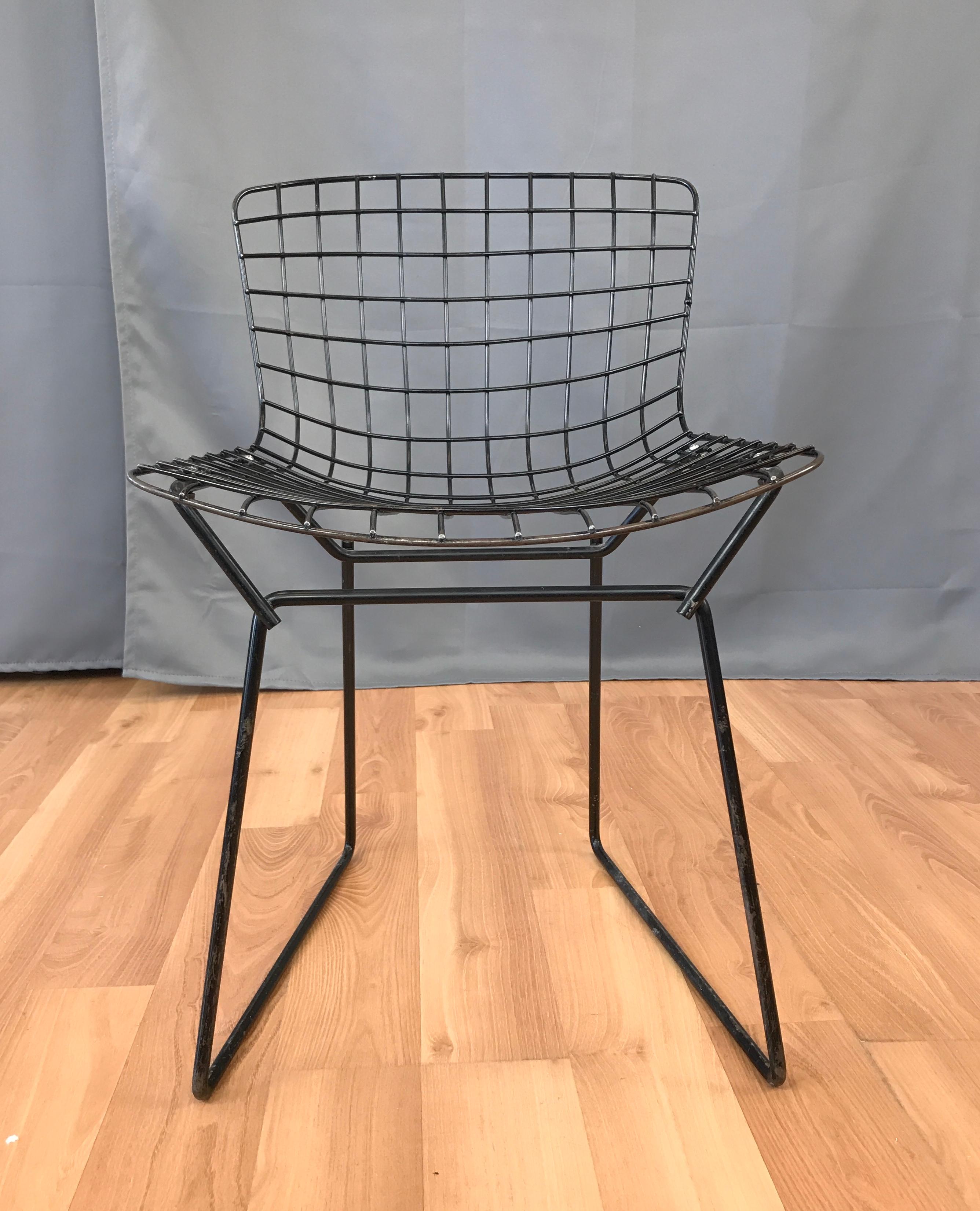 A scaled down Harry Bertoia design for Knoll, child's black wire chair in black, circa 1960s.
