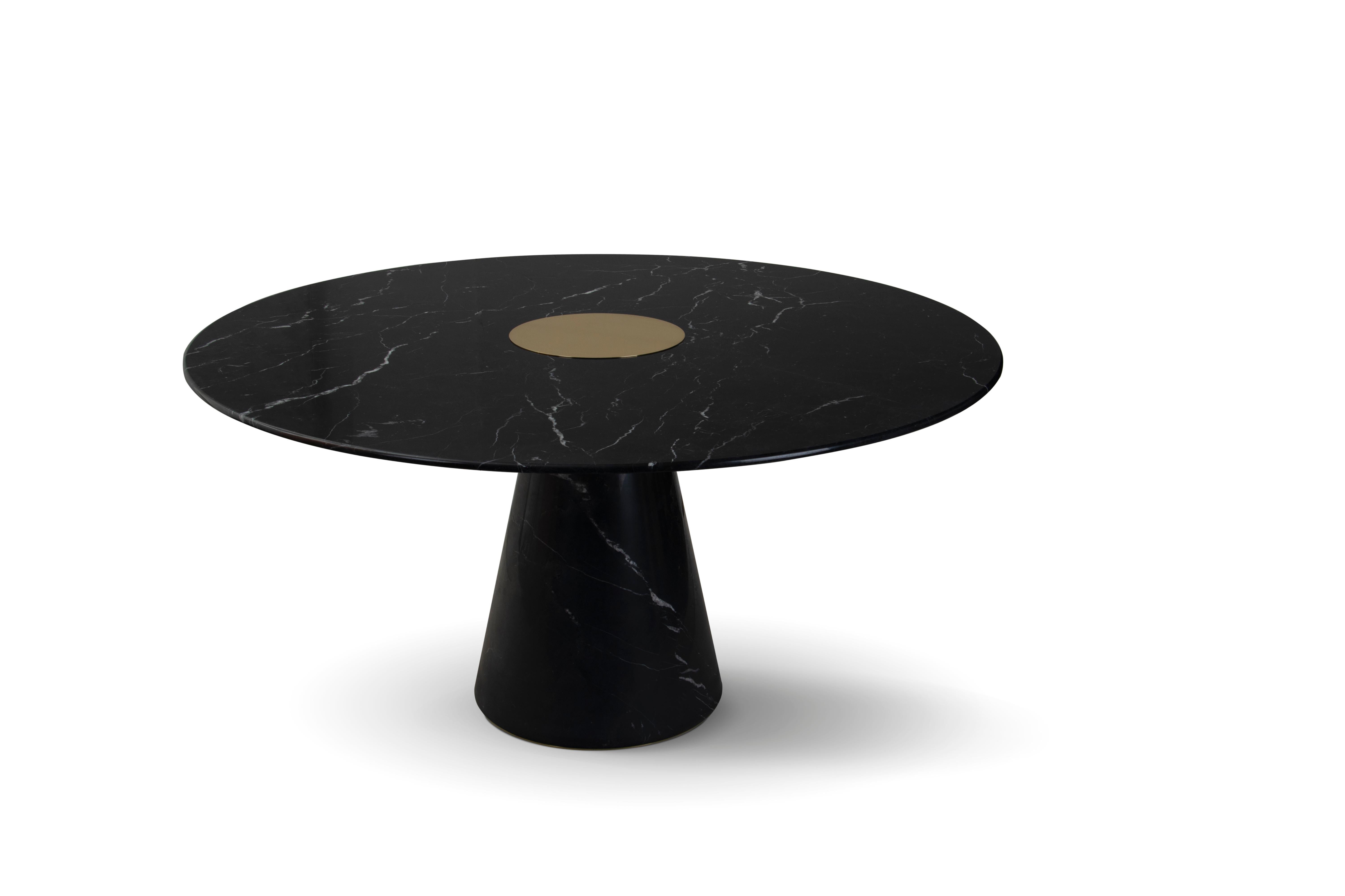 A modern dining table perfect for smaller spaces, with a round shape that is not only trendy but extremely enticing. Designed purely of dark marble, this is a majestic dining table with incredible potential to bring out the best in your dining room