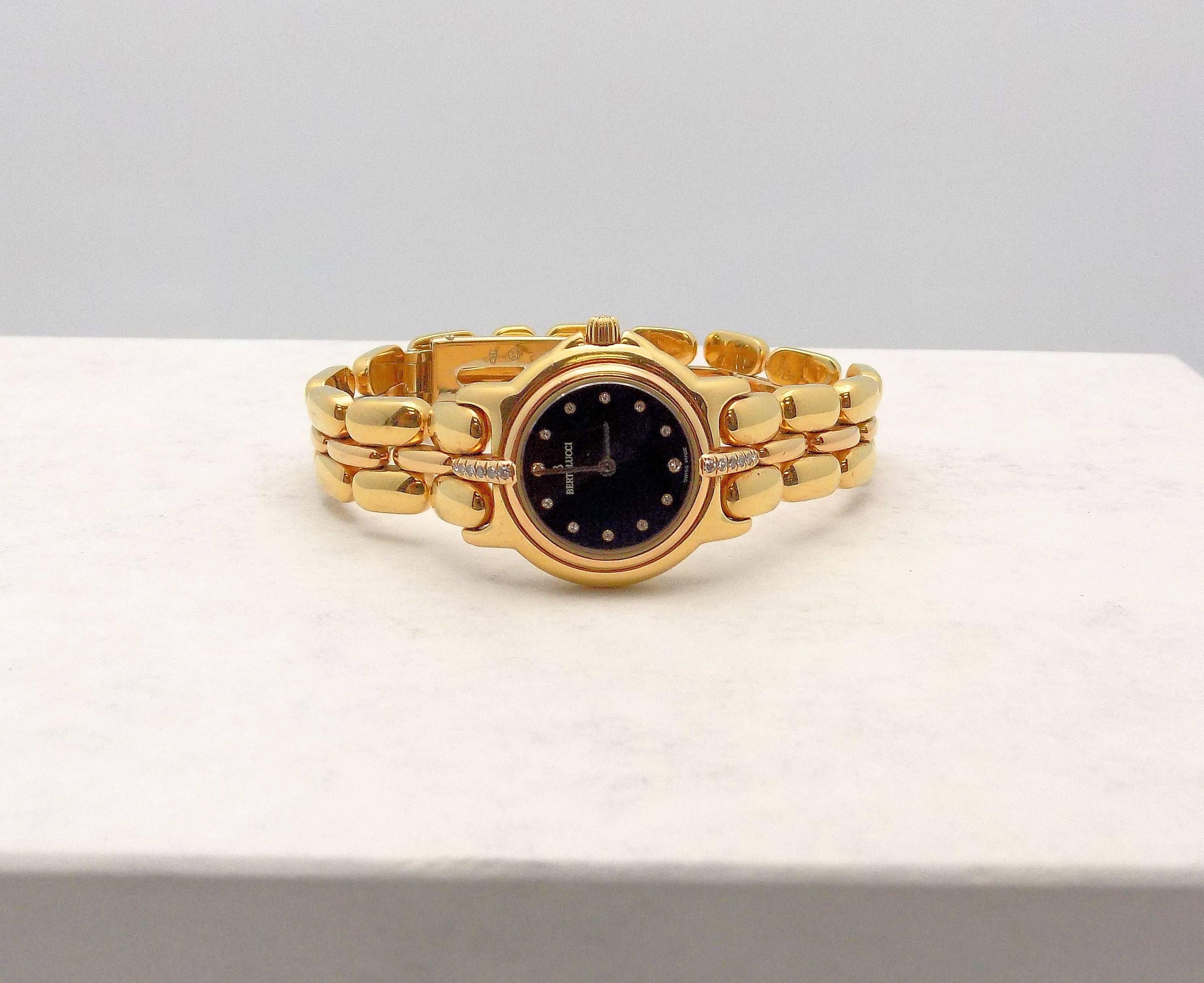 Elegant 18 Karat Yellow Gold Lady's Bertolucci Pulchra Wristwatch Featuring 12 Round Brilliant Diamonds 0.12 Carat Total Weight VVS-2, G; Signed: Bertolucci; 51.2 DWT Gross Weight or 79.63 Grams.