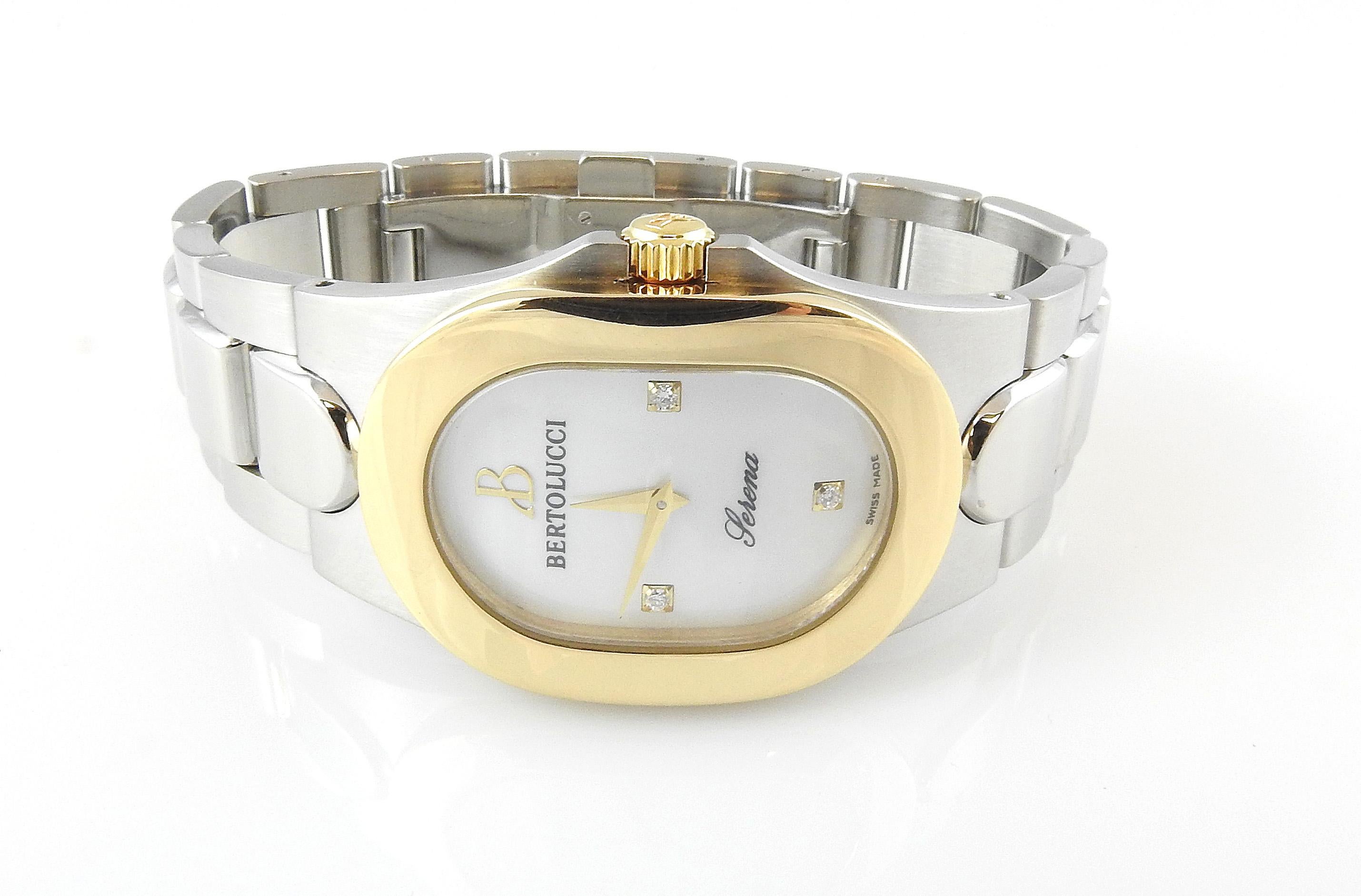 Bertolucci Serena Ladies Watch

Stainless steel case and band with 18K yellow gold bezel and dial

Case is 35mm x 24.5 mm

Mother of Pearl diamond dial.

Fits up to 6