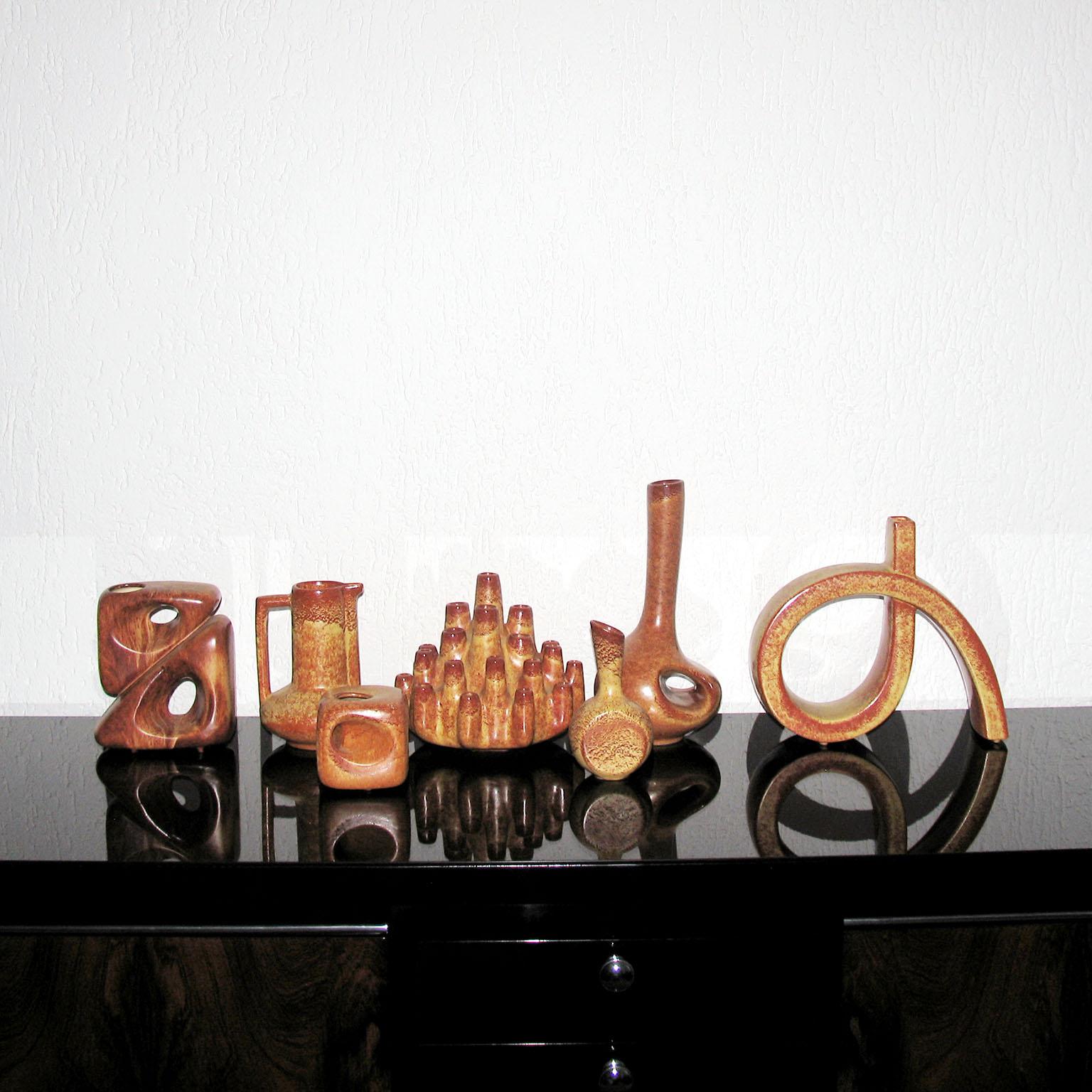 This is a beautiful collection of 7 sculptural Italian ceramic vases, made by Bertoncello Ceramiche D'Arte, Italy, in the 1960s and 1970s.
They are all in very good condition, with normal signs of wear.
They are easy to recognize by their particular