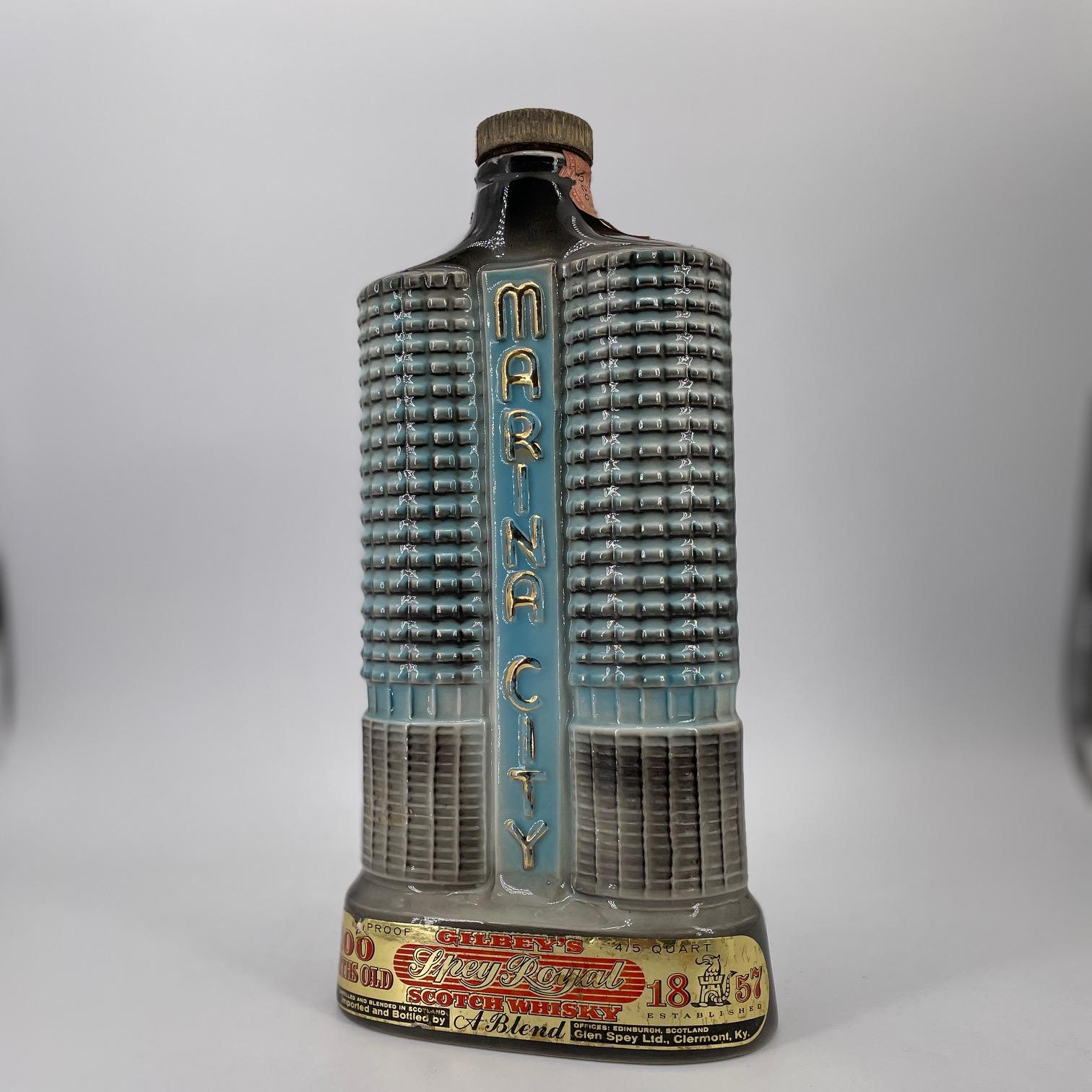A wonderful piece of decor, a hard to find retro Chicago skyline model of the famous Marina City towers.  Signed, Numbered, Dated 1962, C.Miller for J.B. Beam, etc. in the mold, see image of bottom.  Almost 11 inches tall.  

No chips, No cracks to