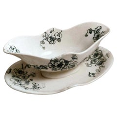 https://a.1stdibscdn.com/bertrand-leon-bordeaux-french-majolica-gravy-boat-capucine-flower-decoration-for-sale/f_46322/f_317479021671098086254/f_31747902_1671098086521_bg_processed.jpg?width=240