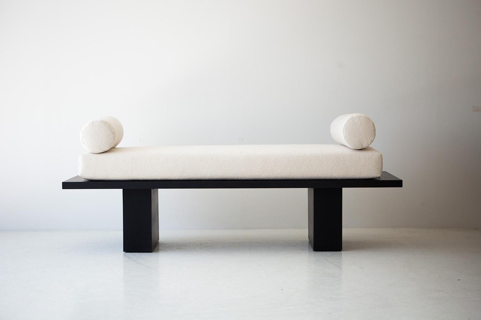 Bertu Benches, Suelo® Modern Bench, Lumbar Pillows, Upholstered, White, Black

This Suelo® Modern Daybed is beautifully constructed from solid wood in Ohio, USA. This silhouette is simple, modern, and sleek, topped with a comfortable cushion. This
