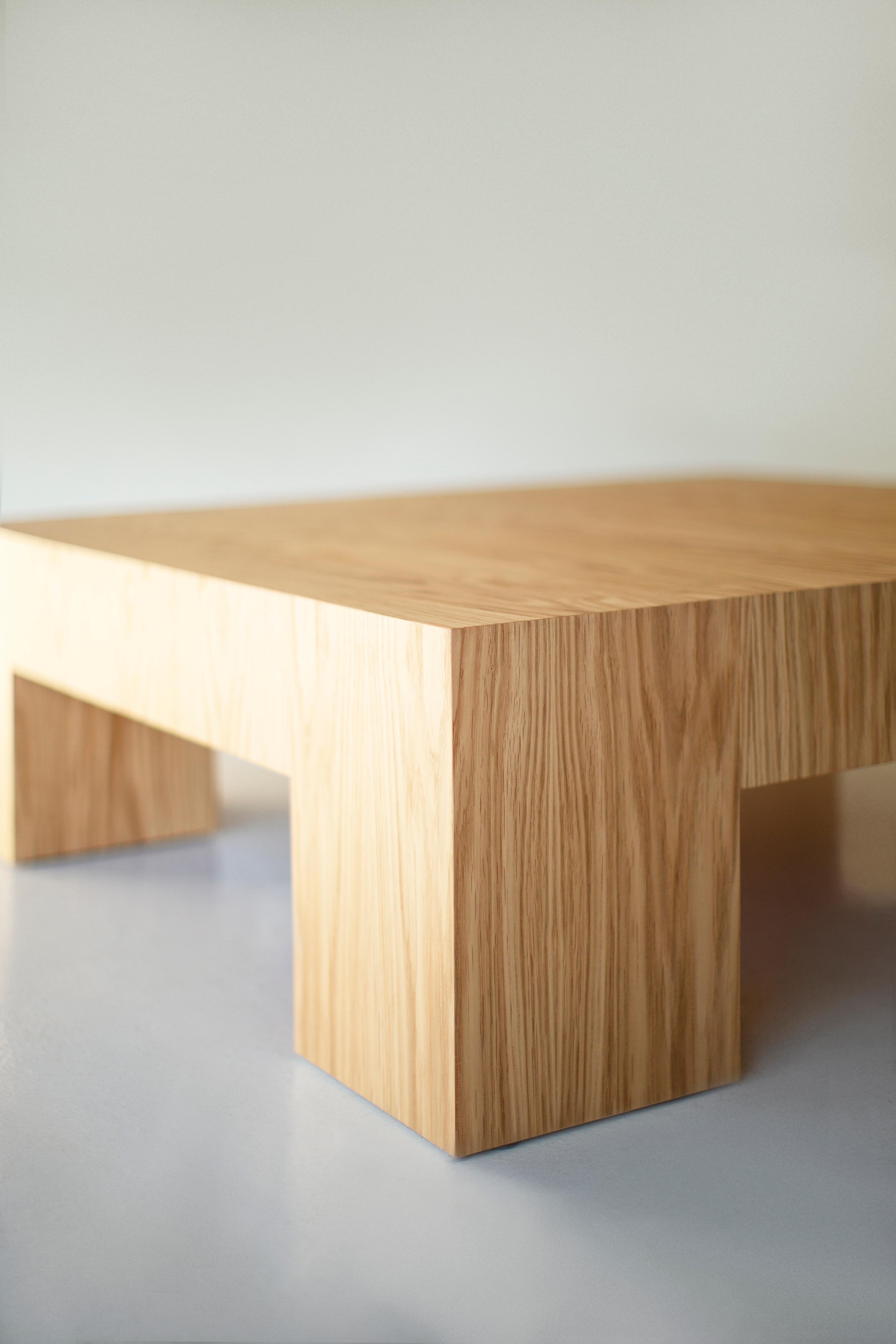 This Modern Coffee Table is made in the heart of Ohio with locally sourced wood. Each table is hand-made with mitered corners from white oak veneer and finished with a beautiful matte commercial-grade finish. These are made to order so you can