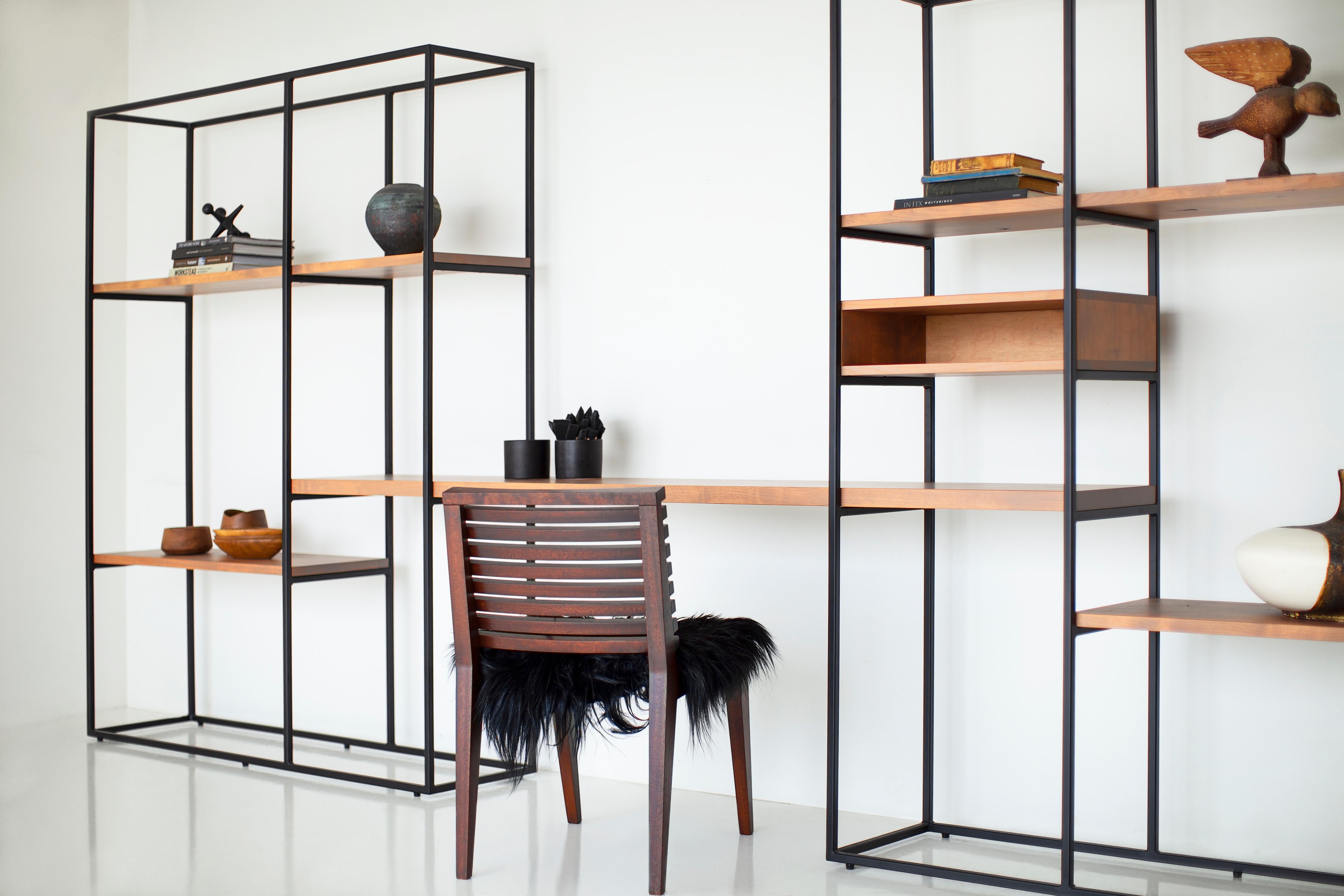 This Industrial Wall Unit is made to work in any space that has the need for open shelving. It's made in the heart of Ohio with locally sourced wood. Each shelving unit is hand-made with hand welded iron and solid Alder shelves finished in a