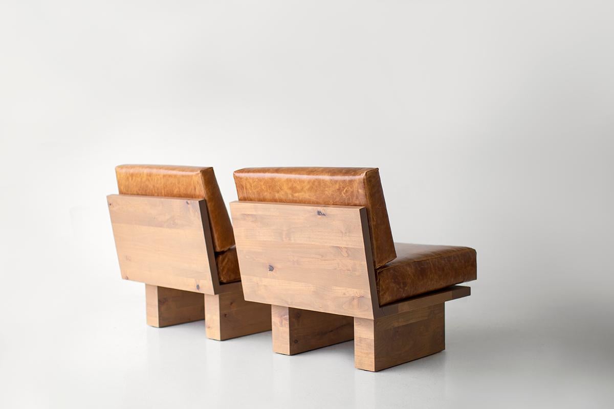 This Suelo® Modern Side Chair is beautifully constructed from solid wood in Ohio, USA. The lounge chair's silhouette is simple, modern, and sleek with comfortable back and seat cushions. This is the perfect chair for any space, indoor or outdoor.