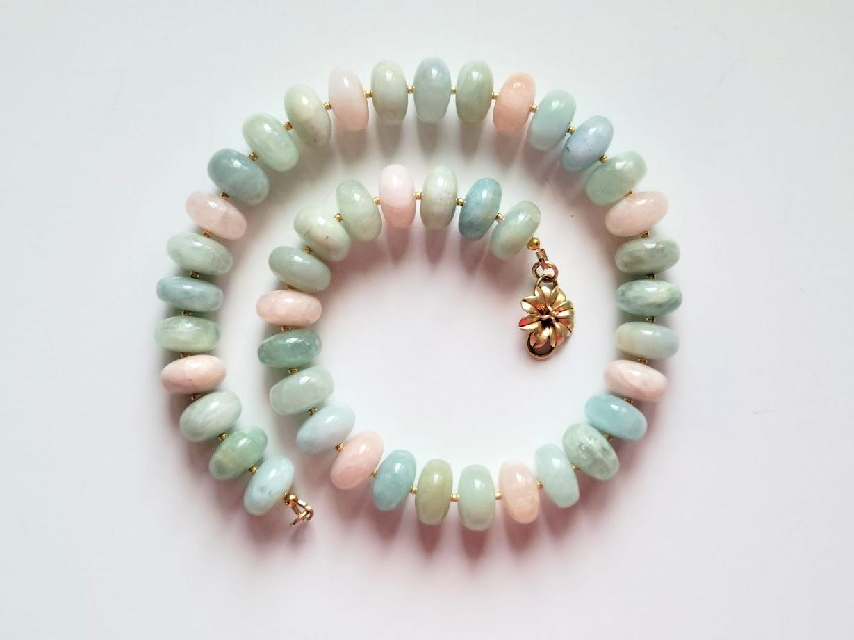 The length of the necklace is 19 inches (48 cm). The size of the rondelle beads is 16.5 mm.
The color of the beads is a soft shade of light green, light blue, pale peachy pink, and pale orange. Very gentle, soft pastel colors! Statement beads of