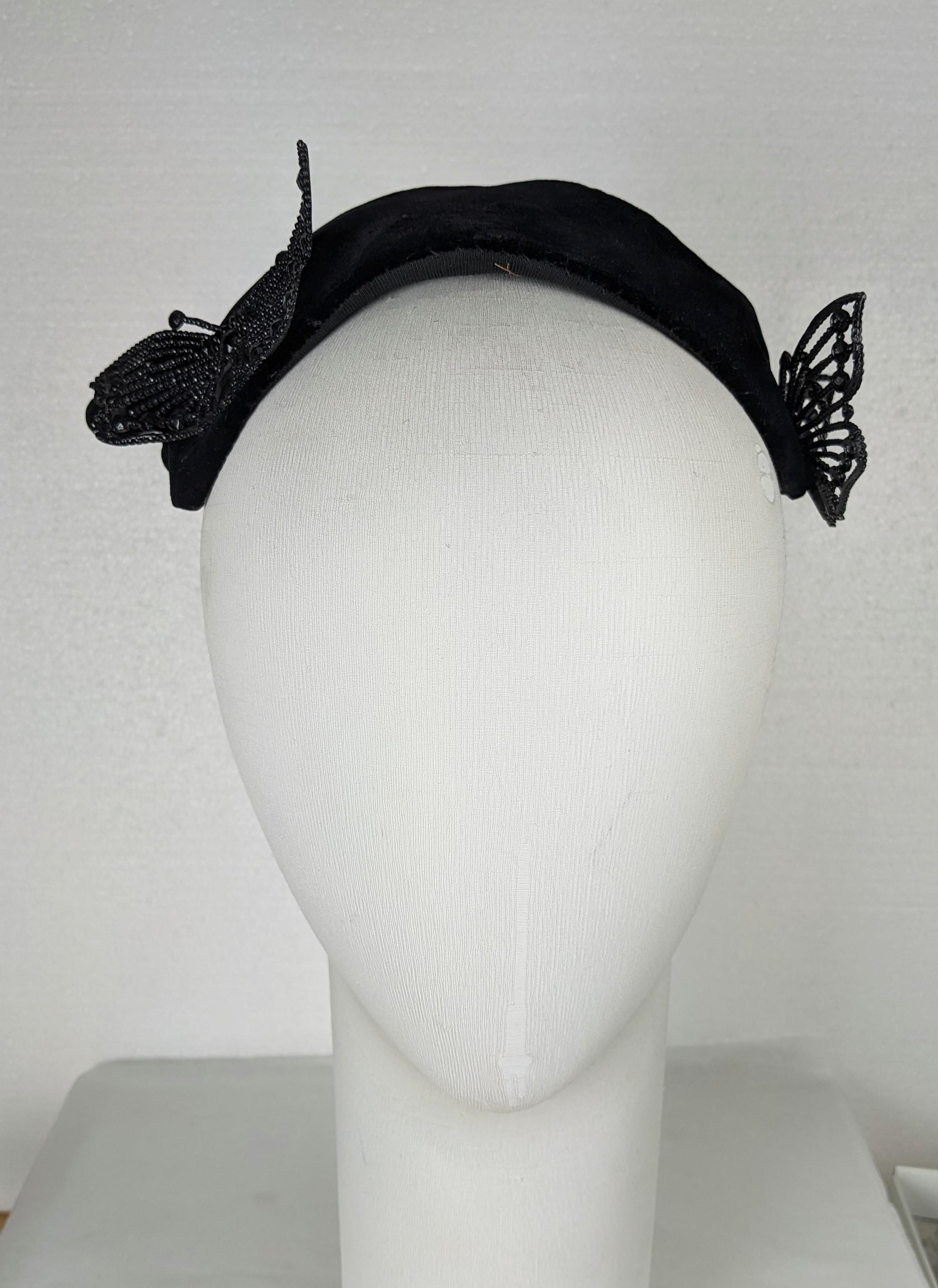 Rare Fantasy Collectible Bes Ben Surreal Mask Hat from the 1940's. The Mad Hatter of Chicago created some of the craziest novelty designs of the period. Black velvet mask shaped hat with Victorian style blacked cut steel butterfly decorations.