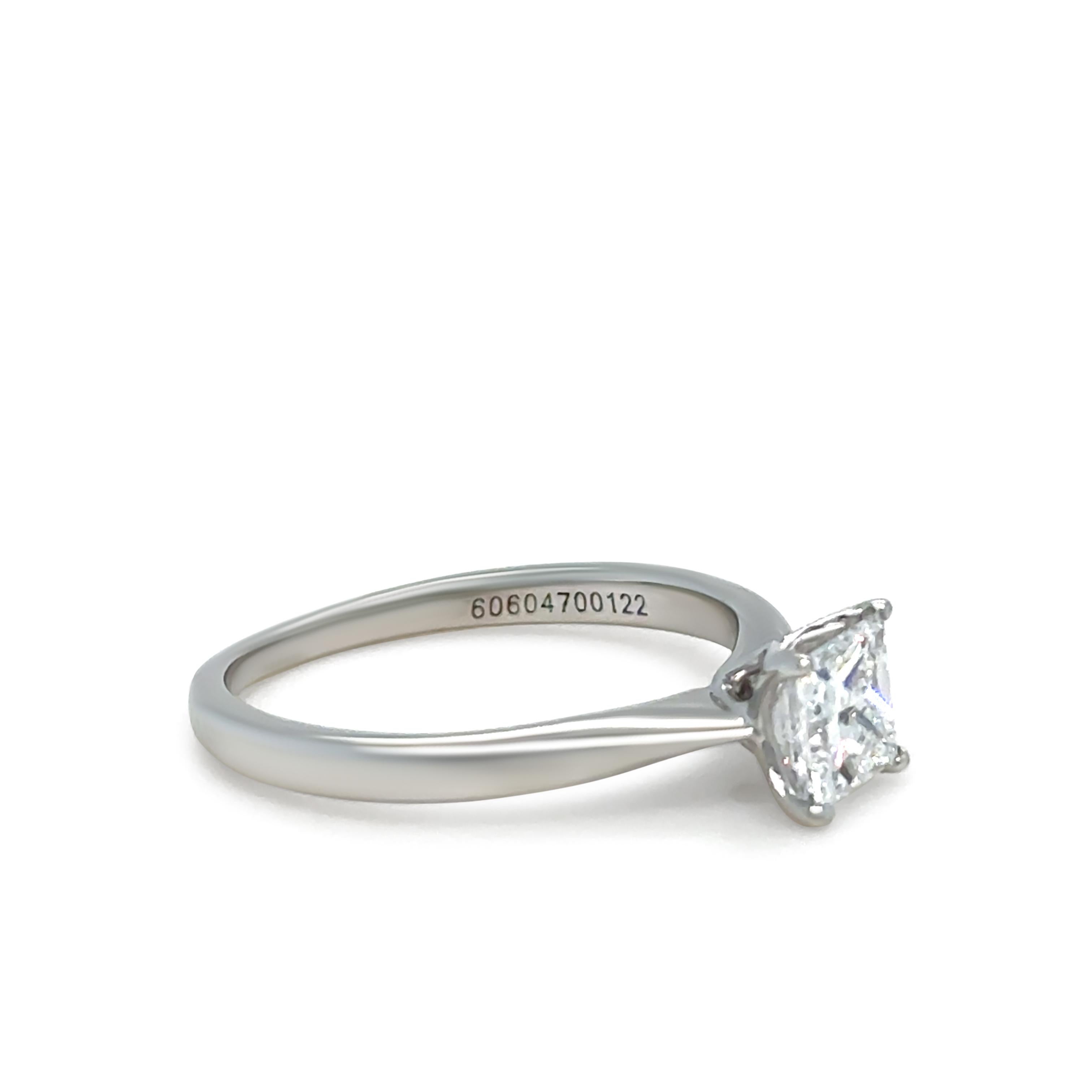 A classic and sophisticated diamond ring, crafted in 14ct white gold. This stunning ring features a 0.70ct princess-cut diamond graded E in color and SI2 in clarity, with very good polish and good symmetry. 

Metal: 14ct White Gold
Carat: