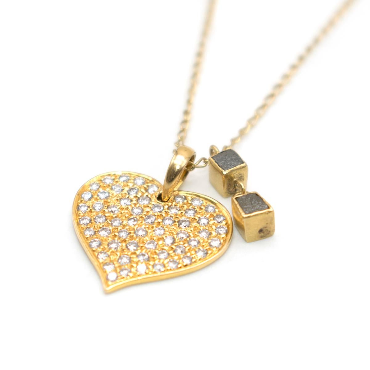 Bespoke 18k Yellow Gold Diamond Heart Long Necklace 

- 18k Yellow Gold 
- Long Double Chained Necklace
- Gold pendant with white diamonds settings
- Cubic pendant details 
- Weight: 5.9g

Please note, these items are pre-owned and may show some