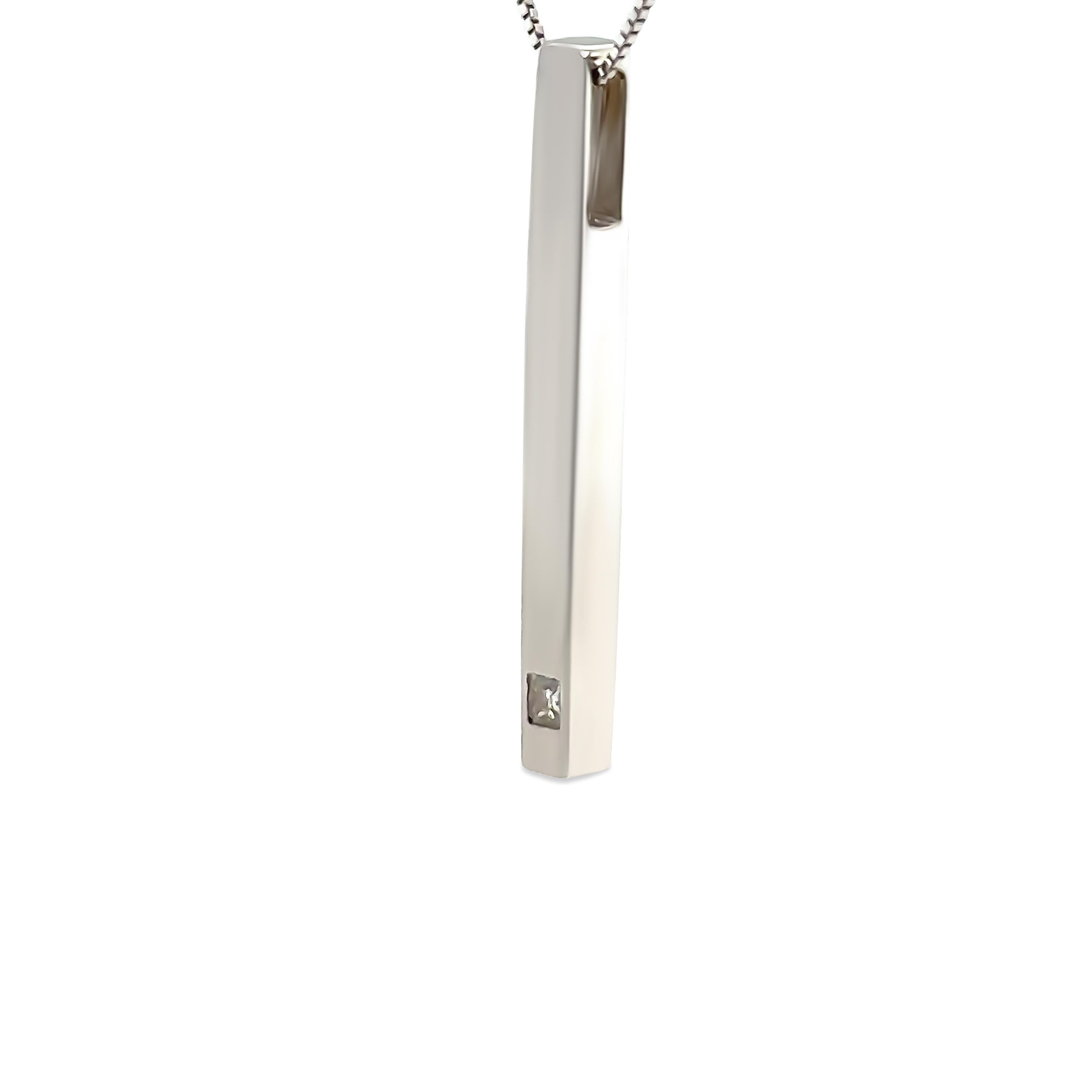 A Bespoke Diamond Pendant and Necklace, made of 18ct White Gold.

The pendant is set with a Princess, brilliant cut Diamond, colour G, and clarity SI1.

Metal: 18ct White Gold
Total Carat: 0.05ct
Colour: G
Clarity: SI1
Cut: Princess Brilliant