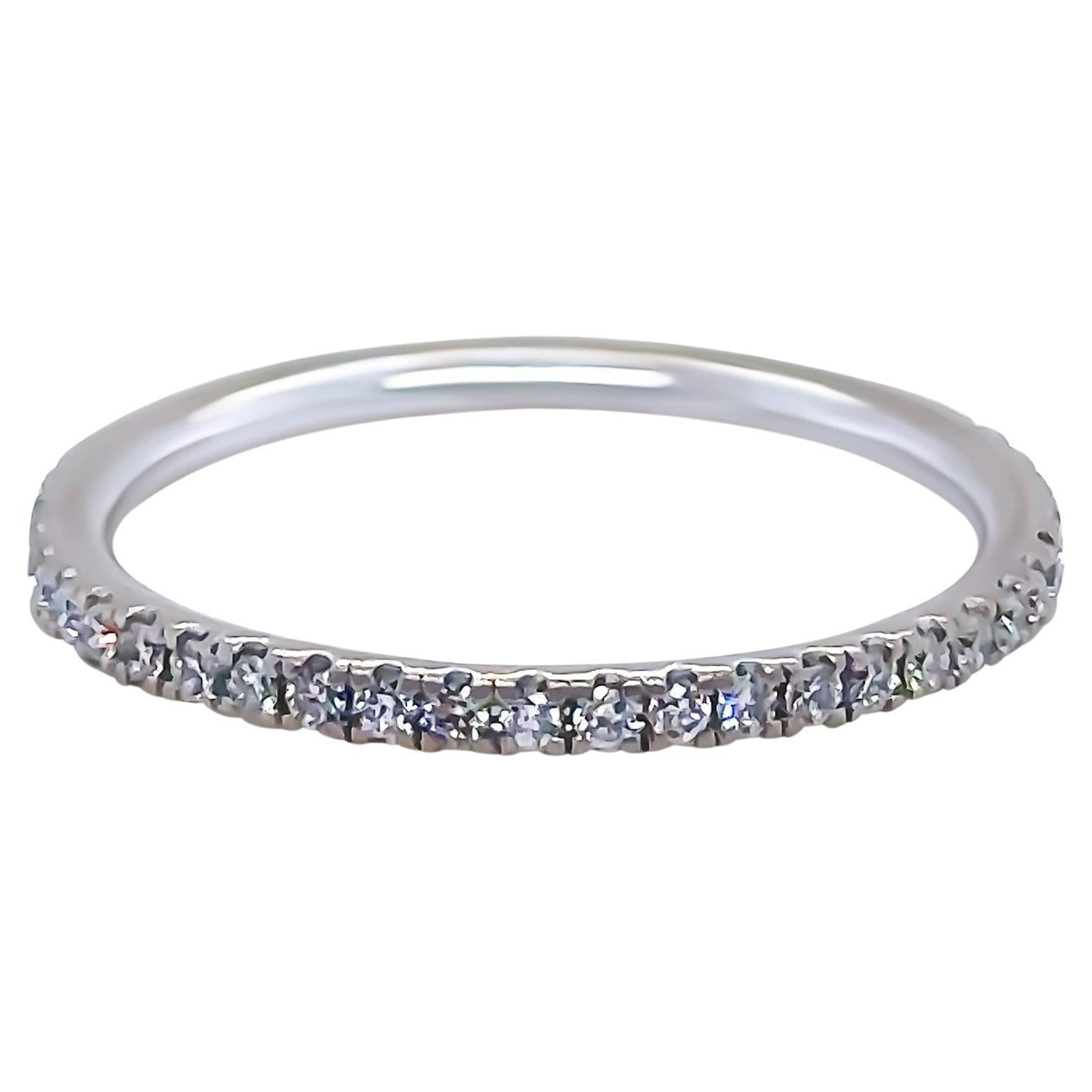 A Bespoke Diamond Wedding Band, made of 18ct White Gold. Featuring 45 Round Brilliant Cut Diamonds in a claw setting, each measuring approximately 1.05-1.10mm in diameter, 0.0075ct. A total of 0.34ct, G/H Colour, VS Clarity. 

Metal: 18ct White