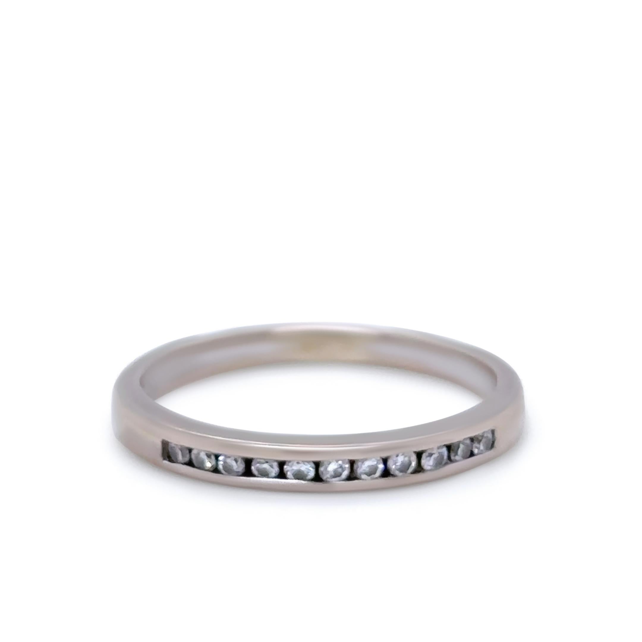 A delicate bespoke 18ct White Gold Half Eternity Band, set with 11 Round Brilliant Cut Diamonds totaling 0.11ct. Crafted with elegance, this ring has a total weight of 1.85 grams.

Metal: 18ct White Gold
Carat: 0.11ct
Colour: N/A
Clarity: N/A
Cut: