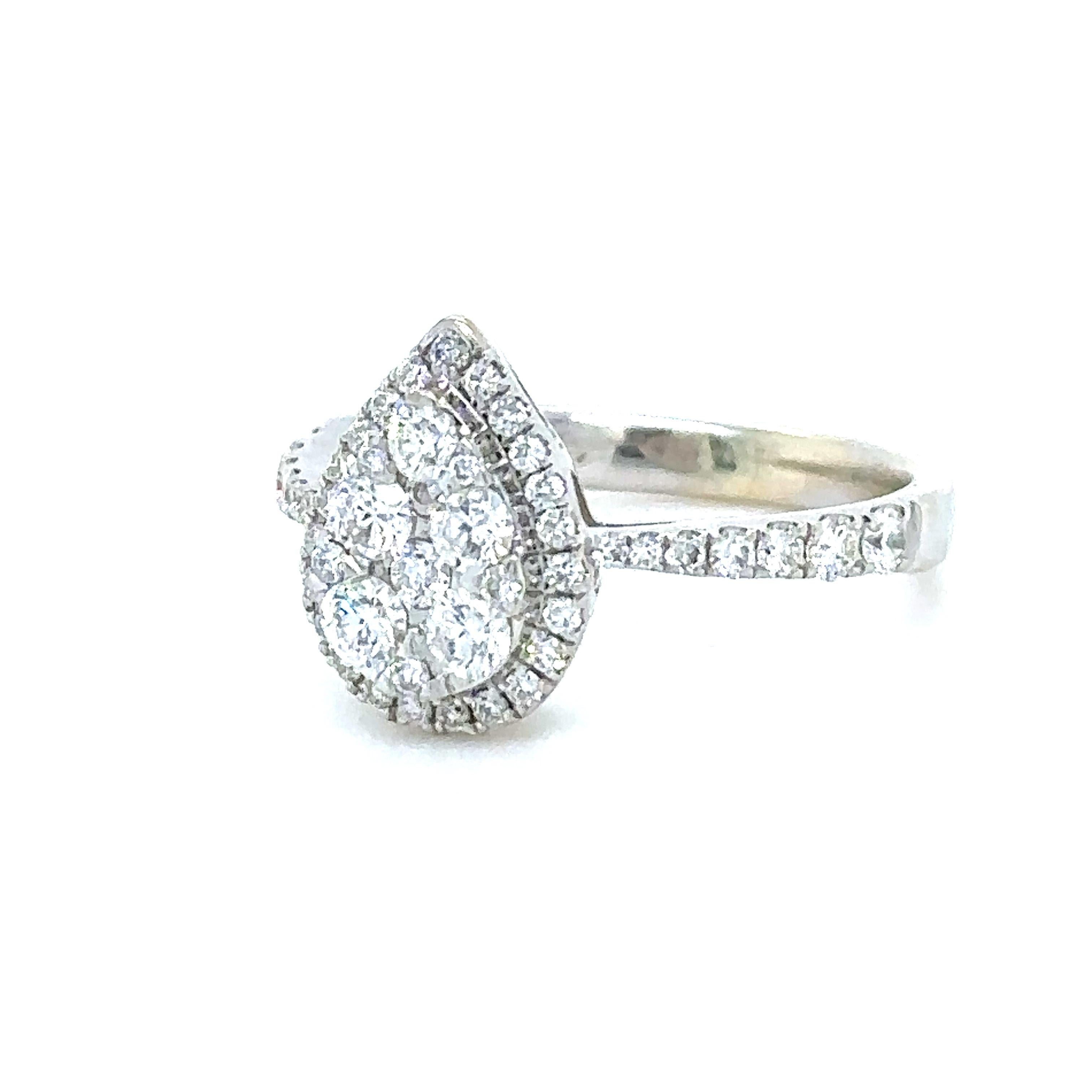 Unique features:

Bepsoke 18ct White Gold Pear Shaped Cluster designed ring featuring 49 diamonds with a total weight of .66ct. F Colour, VS Clarity.

Metal: 18ct White Gold
Carat: 0.66ct
Colour: F
Clarity: VS
Cut: Round Brilliant Cut
Weight: