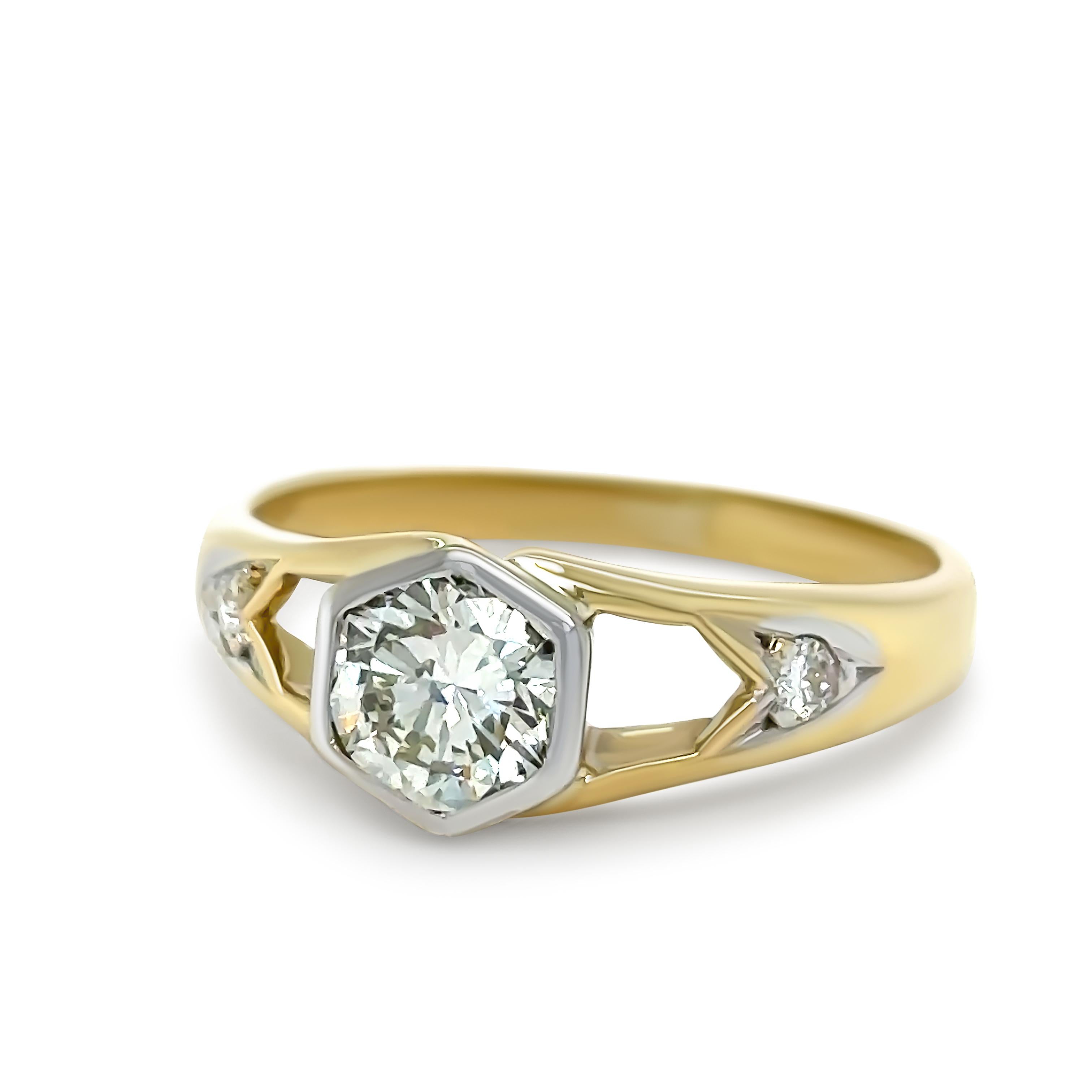 A Bespoke Diamond Engagement Ring, made of 18ct Yellow Gold. Set with a Round Brilliant Cut Diamond, M Colour, VS2 Clarity, with a total carat weight of 0.85ct. 

Metal: 18ct Yellow Gold
Carat: 0.85ct
Colour: M
Clarity: VS2
Cut: Round Brilliant