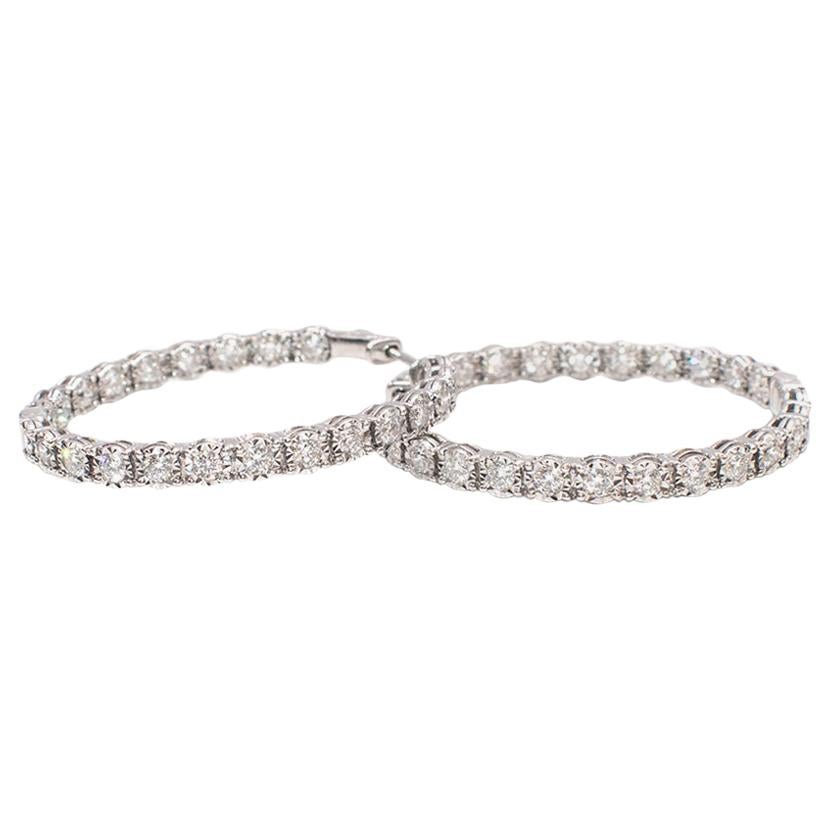 Bespoke White Gold & Diamonds Hoop Earrings

-23 white diamonds to each hoop set on 18 K white gold
-We believe the total carat weight to be approximately 1.38 ct 
-Classic elegant style 
-Super practical fastening system 
-versatile and easy to