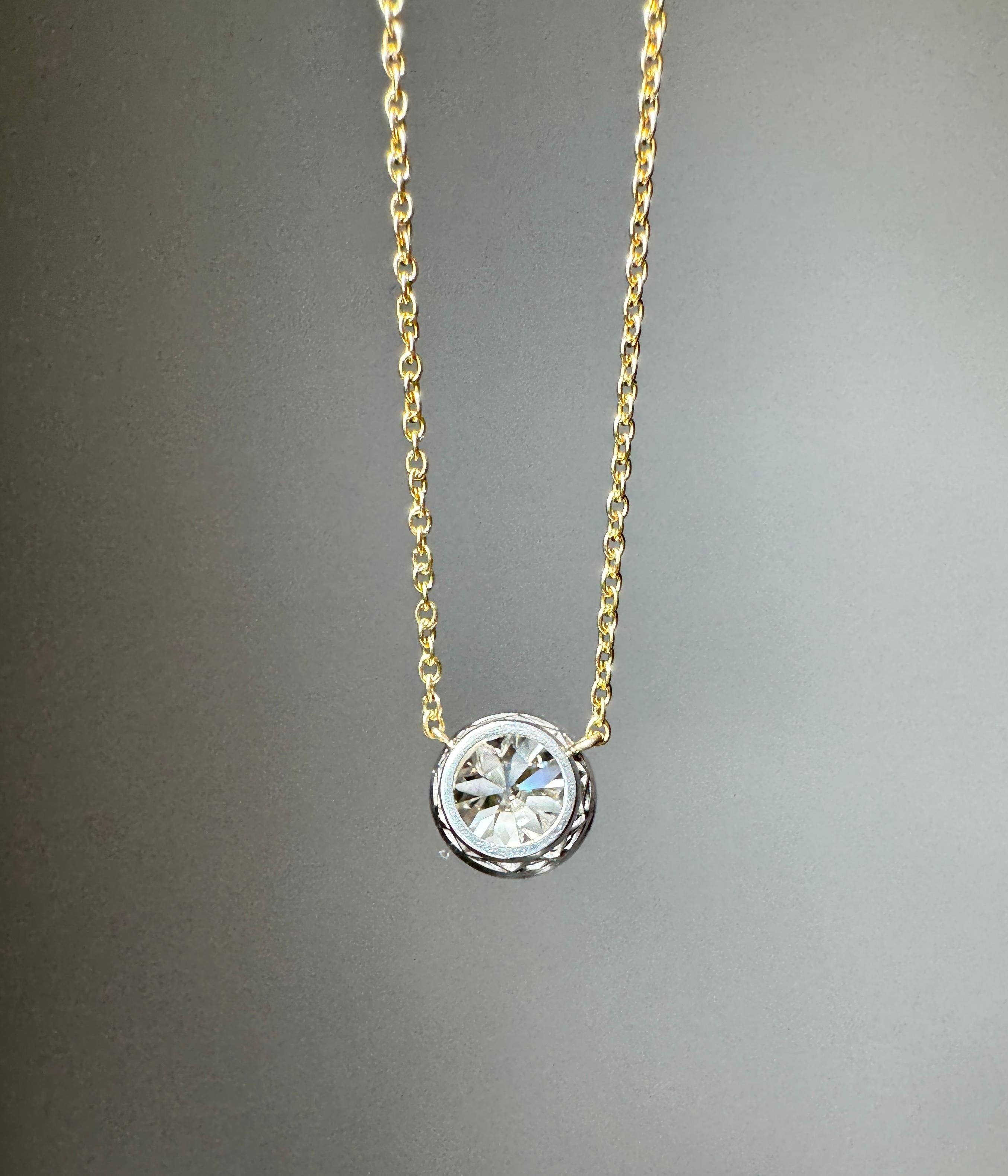 Effortlessly beautiful, a 1.97 carat European-cut diamond shimmers from inside a platinum bezel, suspended on a delicate 14 karat gold chain. The perfect accessory for every occasion.


Diamond: 1.97 carat, VS2 clarity with L color

Length: 15