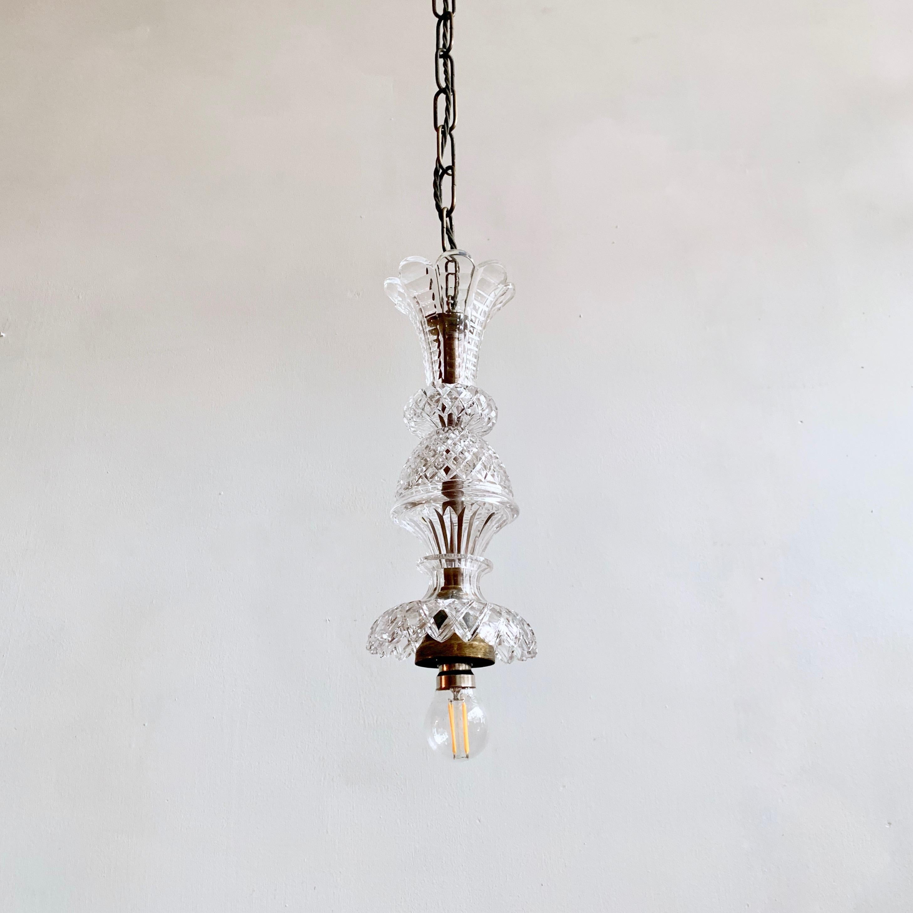 This pendant has been made with stacked antique English crystal chandelier parts – mostly ones that would usually go on the central stem of a chandelier. Each pendant is bespoke. The pendant requires a single B22 lamp. The pendant comes supplied