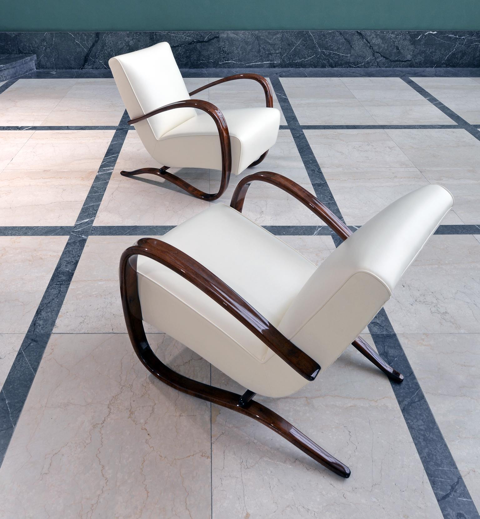 Art Deco - Streamline armchair model H 269, designed by Jindrich Halabala and manufactured by UP Závody Brno, circa 1940.

This original Halabala Armchair pair, were skillfully restored and turned into a luxury, made to last furniture. Beech