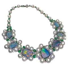 Collar a medida de ópalo australiano y diamantes en oro blanco de 18 quilates. Collar a medida de ópalo australiano y diamantes en oro blanco de 18 quilates.