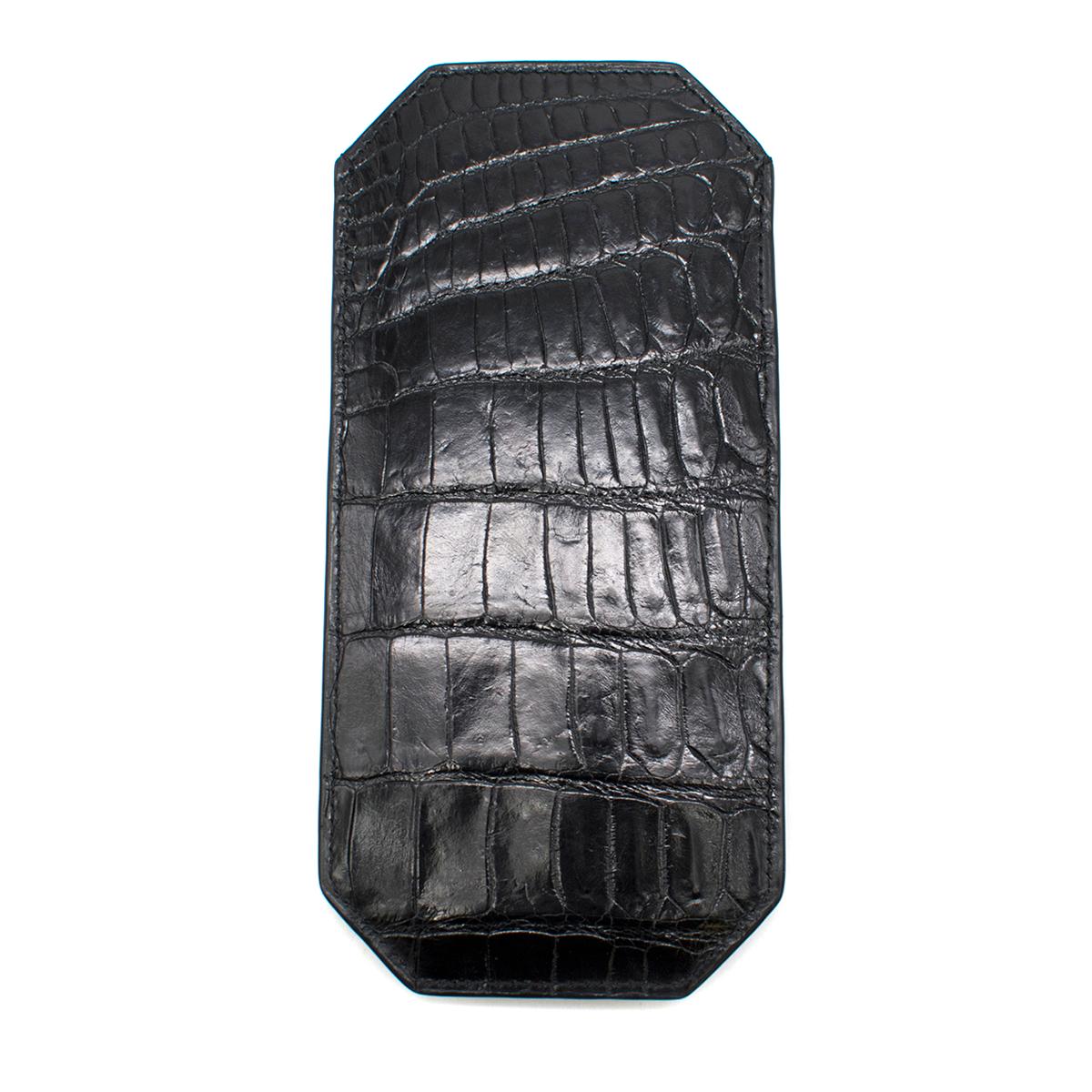 Bespoke Black Crocodile Leather Diamond 'M' Sunglasses Case

- Black crocodile leather sunglasses case
- Front white gold M with diamonds
- Can also be used to storage other items such as small cellphones

Please note, these items are pre-owned and