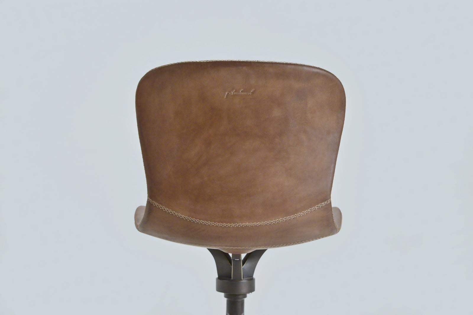 Thai Bespoke Brass Swivel Chair with Floor-Ring, in Truffe Leather, by P. Tendercool For Sale