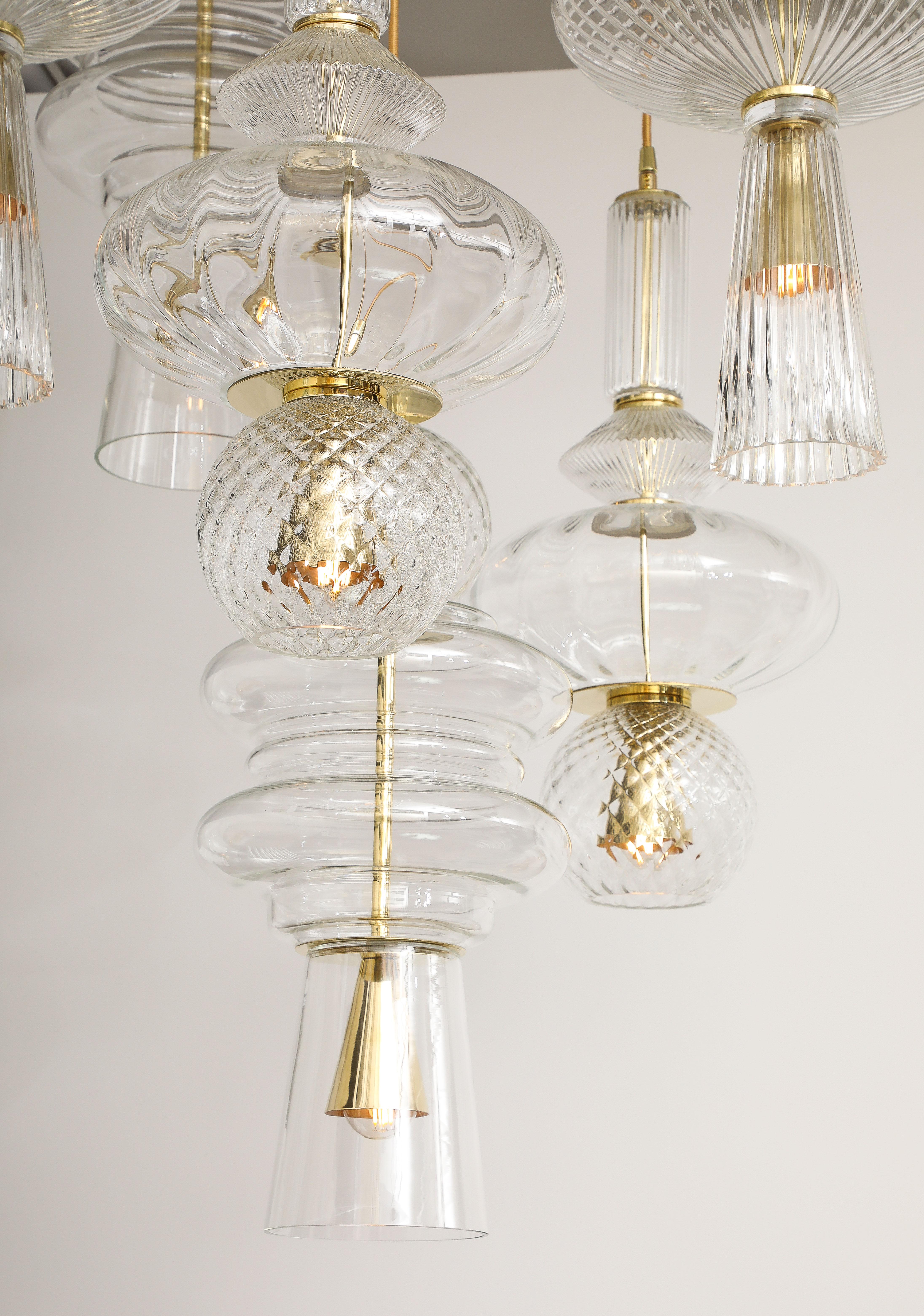 Bespoke Clear Murano Glass Pendants with Brass Suspension Chandelier, Italy. This bespoke suspension chandelier was designed by and custom made to order for Karina Gentinetta by a master glass artisan in Venice, Italy.  Six (6) hand-blown clear