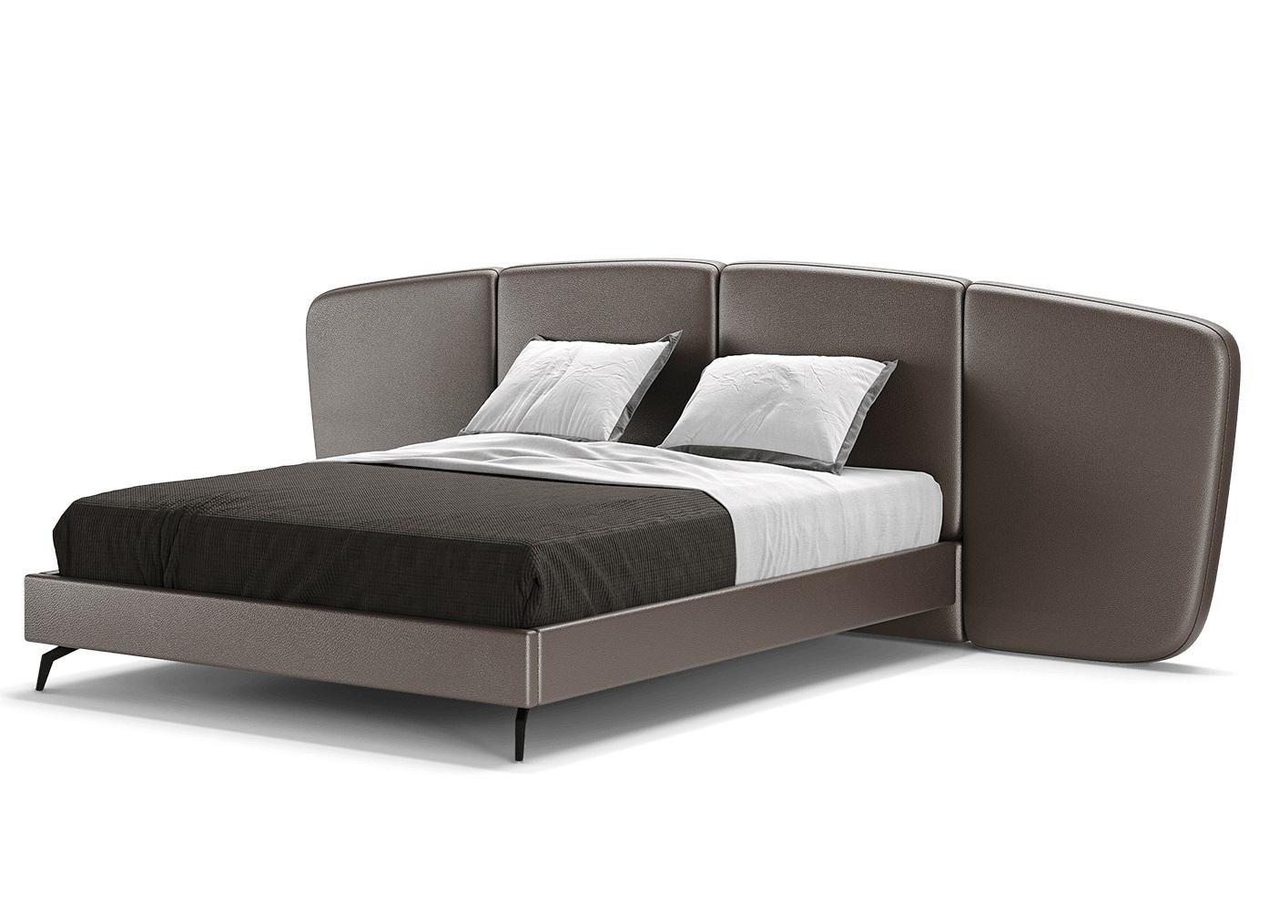 This bed features a modern, minimalist design with a bold presence. Its defining element is the curved, segmented headboard, which spans the full width of the bed, creating a sense of enclosure and elegance. The headboard's panels are gently angled
