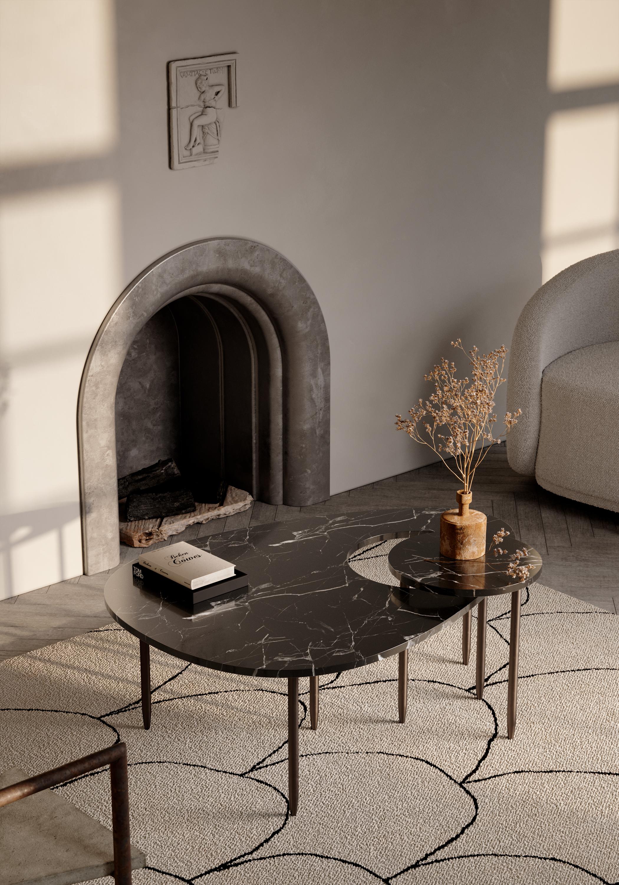 Inspired by our midnight muse, our contemporary marble table with an interconnecting smaller table floating on linear legs. Placed in the night sky, a soft reflection of the moon lights up a path, creating an illuminating display of art on the