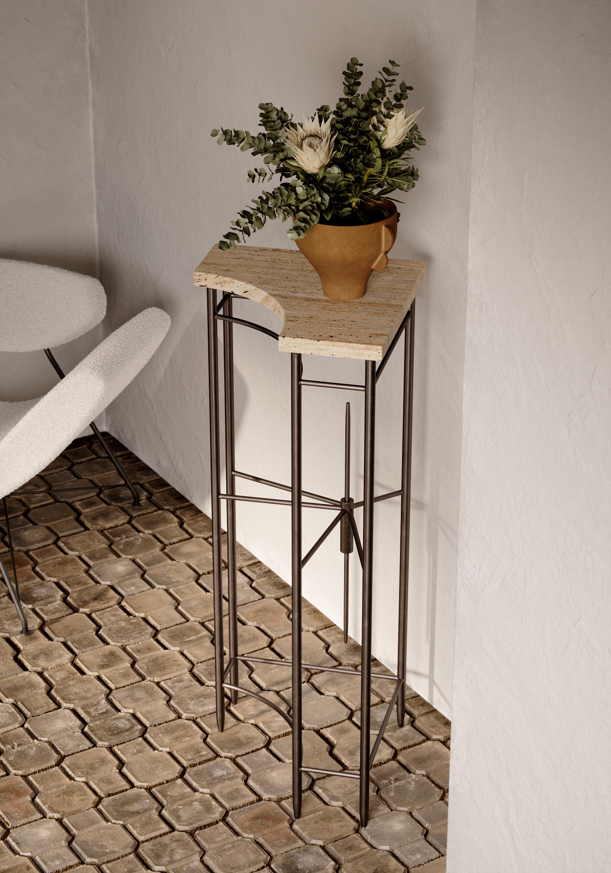 A structural interpretation of space and historic architecture, our contemporary table is skillfully crafted by organic materials, a sand-colored marble top that is geometrically shaped by a crescent moon and thoughtfully placed on steel legs. The