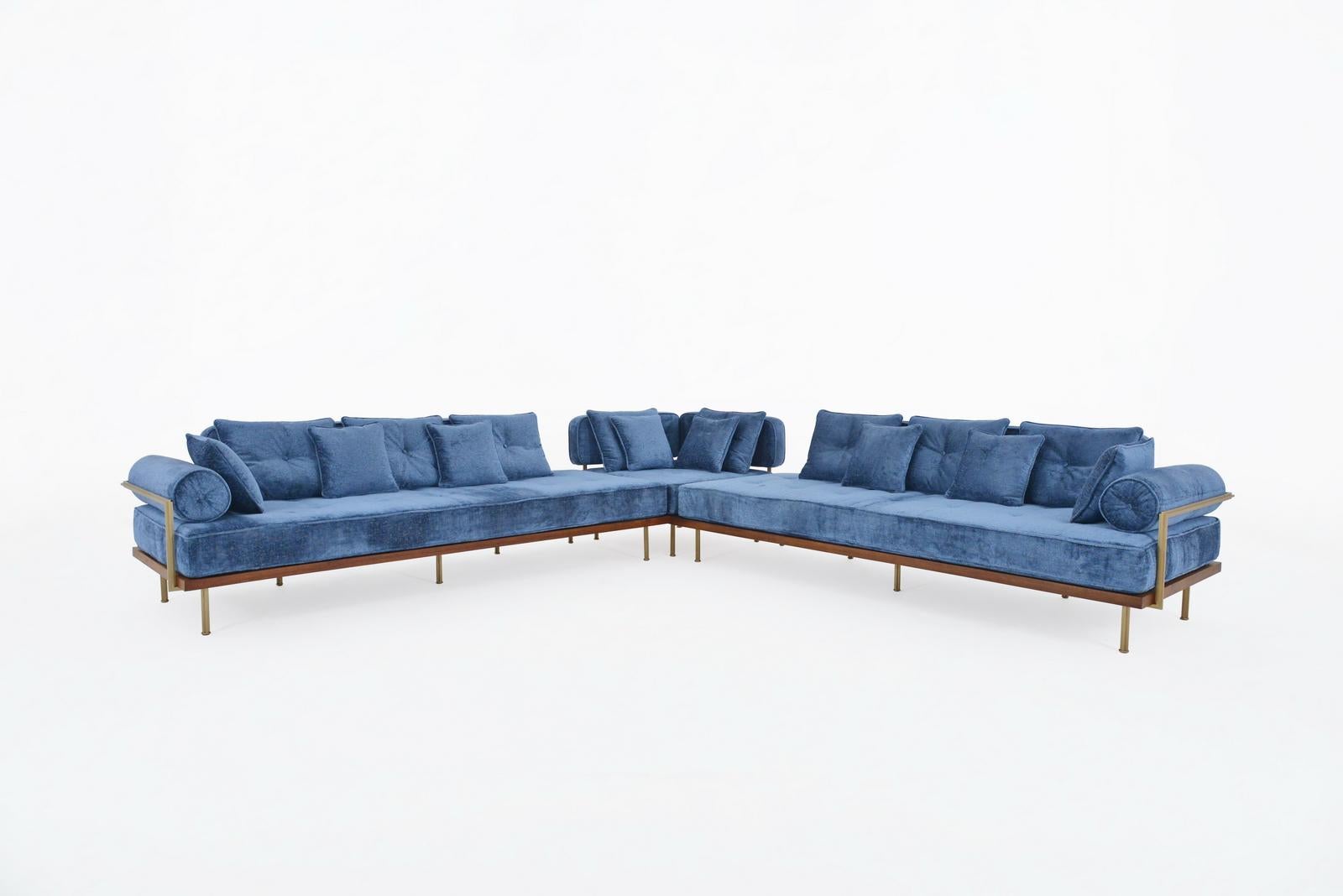 Our long-term client-turned-friend recently ordered our sectional or L-shaped sofa, featuring left, corner, and right components for flexible configurations. Crafted with care, the sofa boasts reclaimed aged Teak wood, hand-welded brass rods, a pure