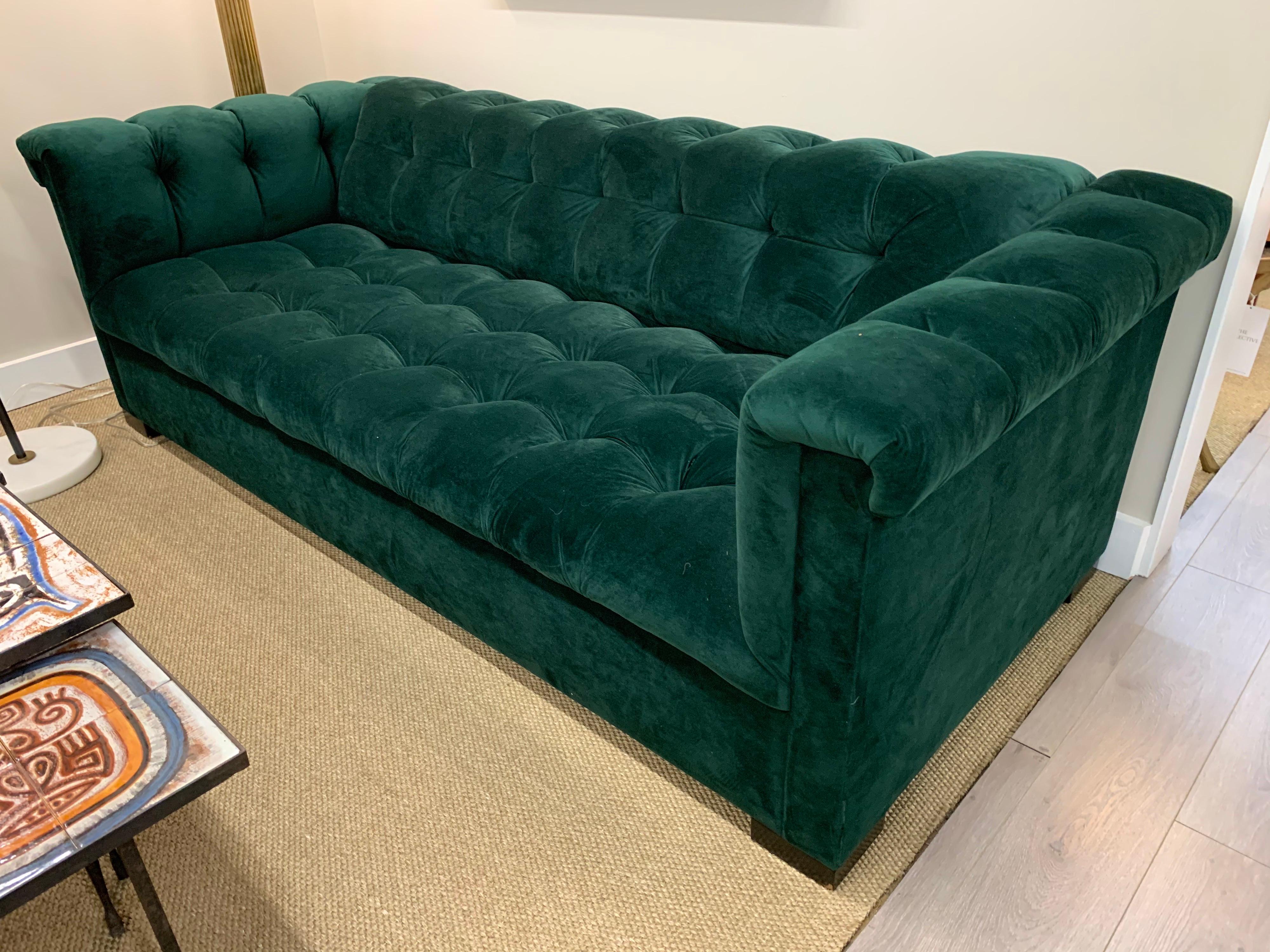 Exceptional, bespoke tufted green velvet sofa with chesterfield design. The fabric is magnificent, the lines perfect, and the craftsmanship second to none. It has never been sat in for more than a moment.
 