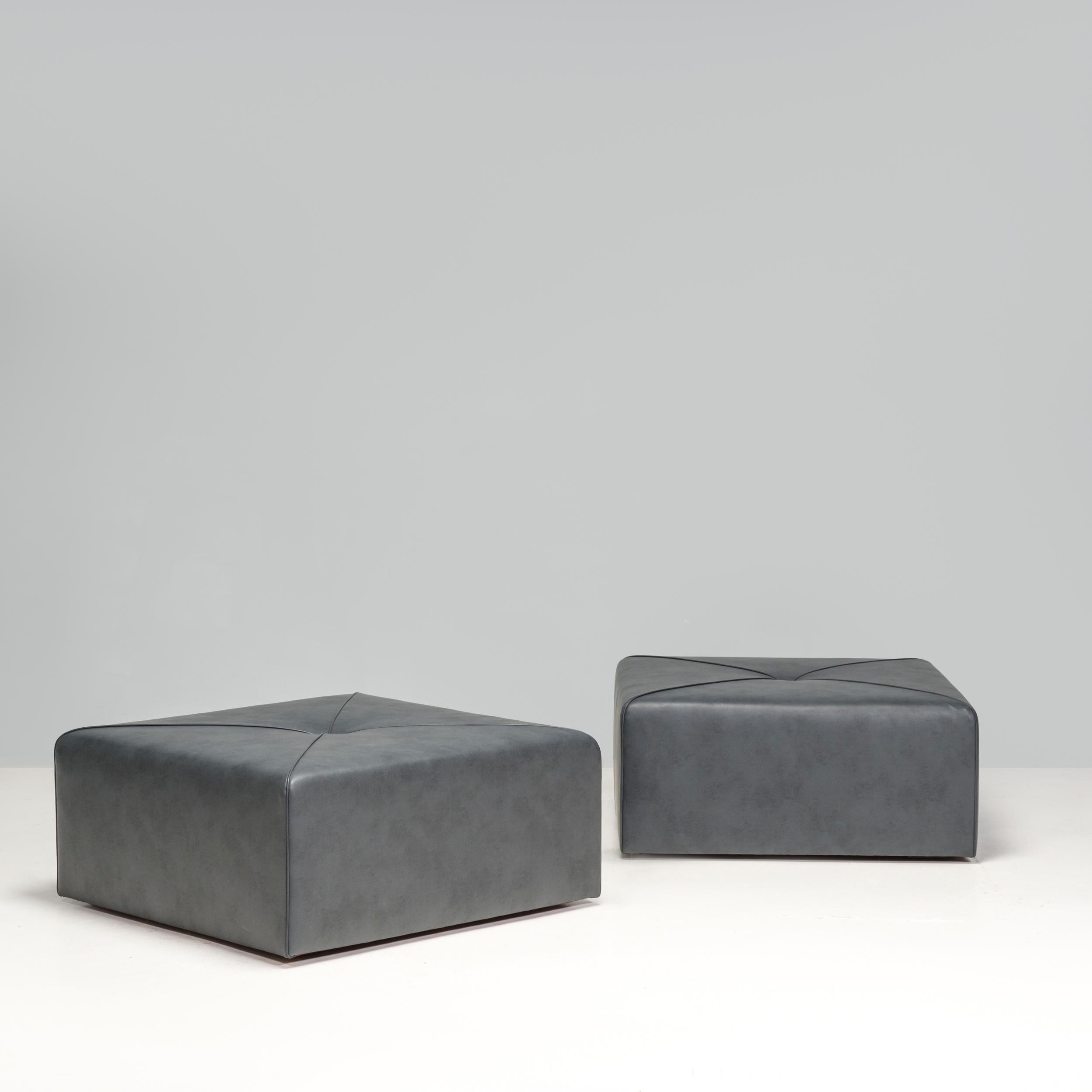 This bespoke square ottoman is the ultimate all-in-one lounging accessory with an edgy rustic design & high-quality finish is extremely versatile.

Boasting double seaming diamond pattern and faux dark grey leather, this striking piece maintains all