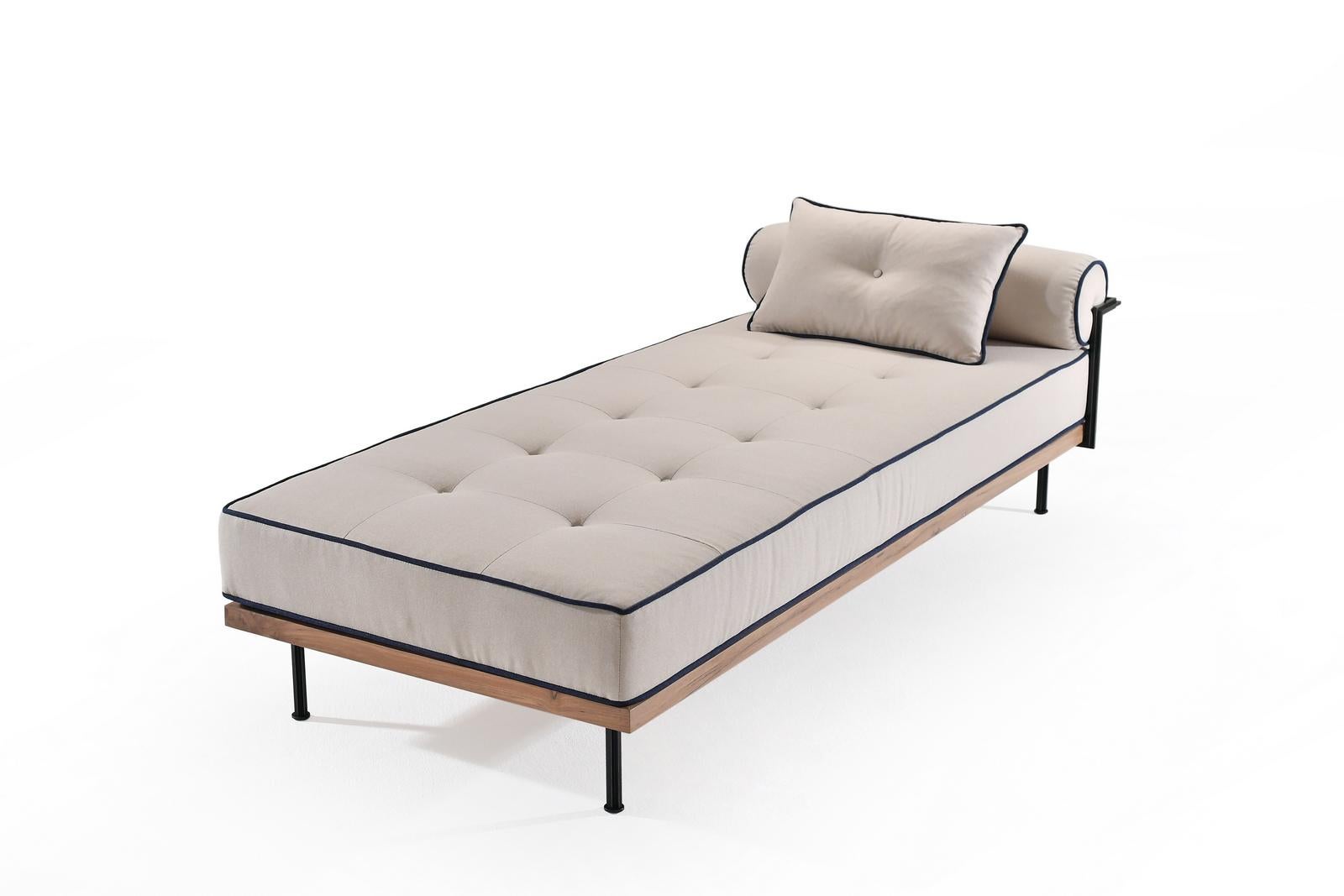 We recently created this daybed for the client of an interior designer in Massachusetts. She sent us her own fabric to create a daybed in beige with contrasting pipings in navy blue. 
let us know how we can help you, we’d be glad to put our creative
