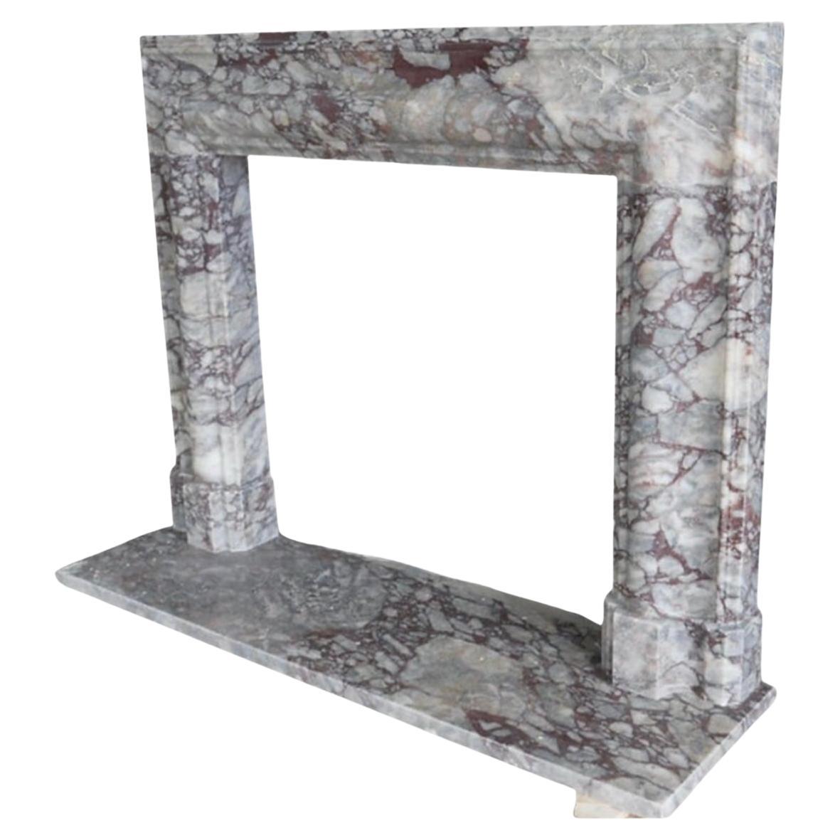 This bespoke designer Viola marble fireplace mantel offers the ultimate in luxury and craftsmanship. Made to order, each mantel is meticulously crafted from exquisite Viola marble, ensuring a unique and personalized statement piece for your home.